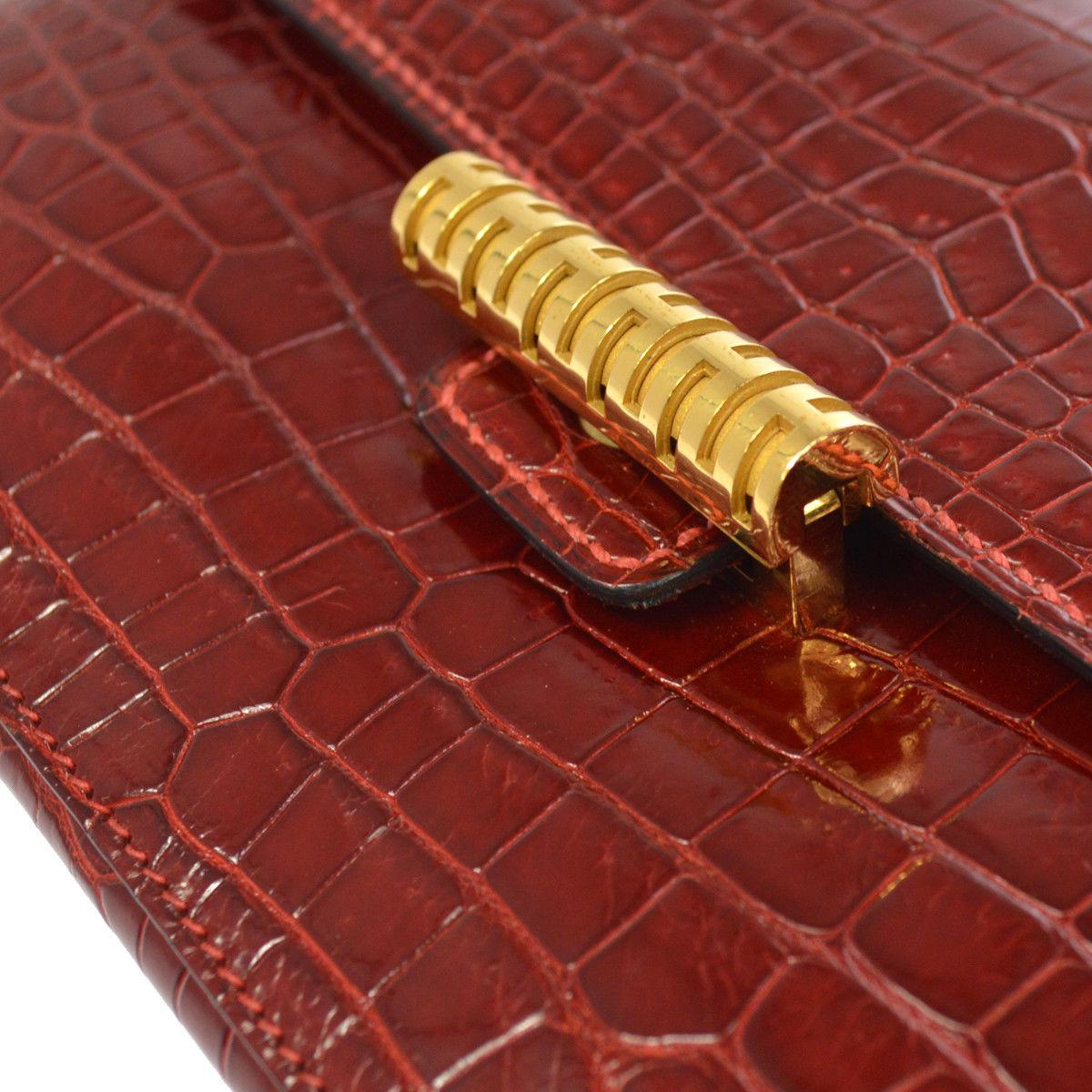 Hermes Rare Red Crocodile Leather Gold 2 in 1 Evening Clutch Shoulder Flap Bag in Box 

Crocodile
Gold hardware
Leather lining 
Made in France
Removable shoulder strap drop 18