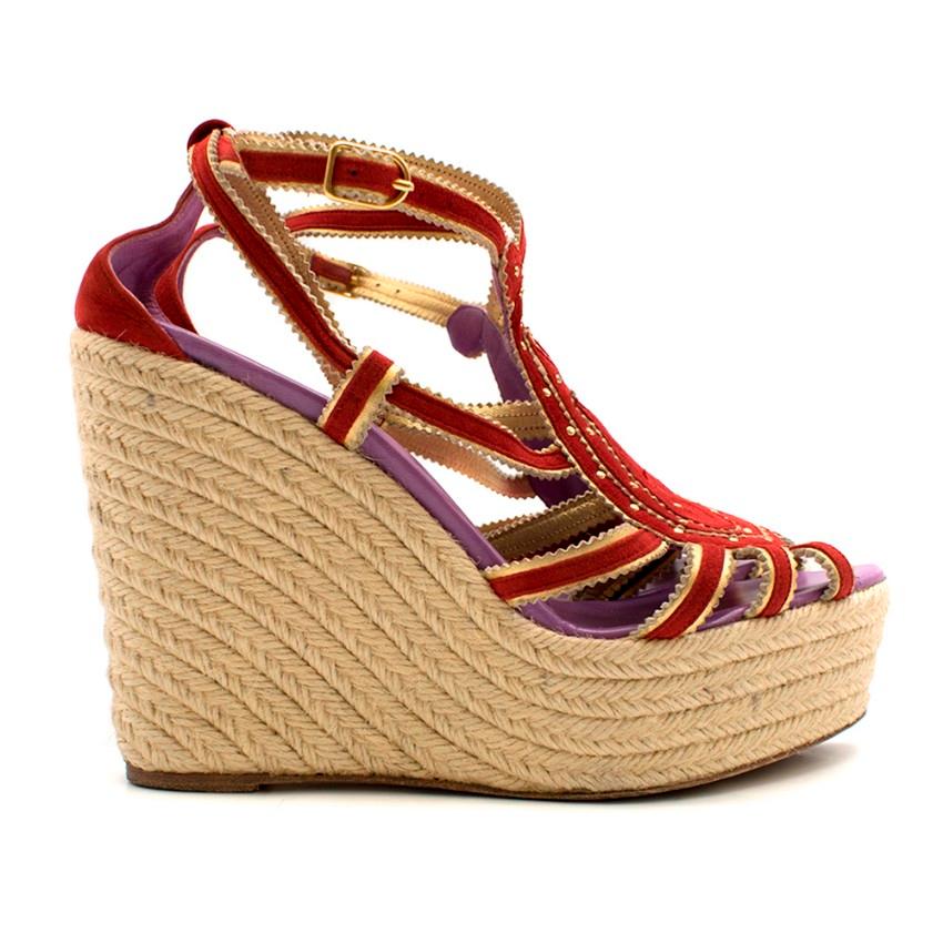 Hermes Red Espadrille Wedges 

- red espadrille wedges
- platform 
- leather insole and sole
- embellished front 
- buckle fastening around the ankle 

Please note, these items are pre-owned and may show some signs of storage, even when unworn and