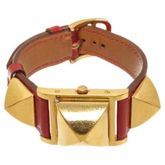Rote vergoldete und vergoldete Medor-Quarz-Uhr von Hermès