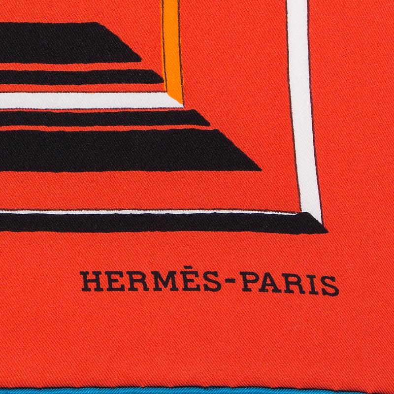 Hermes 'Jumping 90' scarf in red, petrol, white, yellow, black and orange with contrasting petrol border silk twill (100%). Has been worn and is in excellent condition.

Width 90cm (35.1in)
Height 90cm (35.1in)