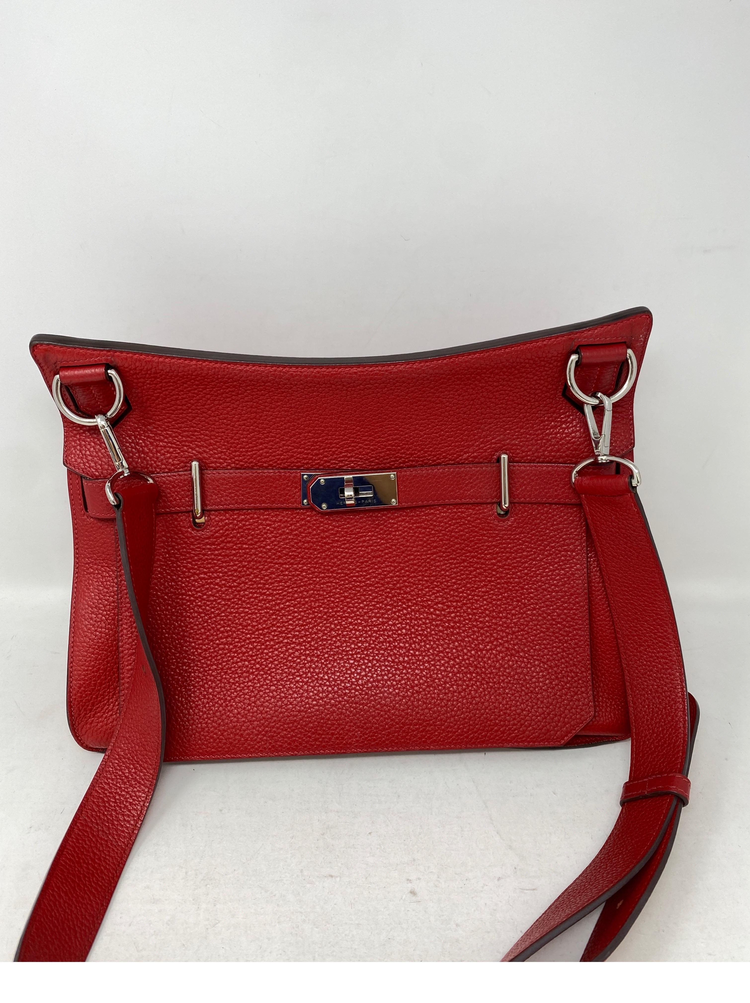 Hermes Red Jypsiere 34 Bag. Togo leather. Palladium hardware. Good condition. Larger crossbody bag. Can be shorter too. Interior very clean. Guaranteed authentic. 