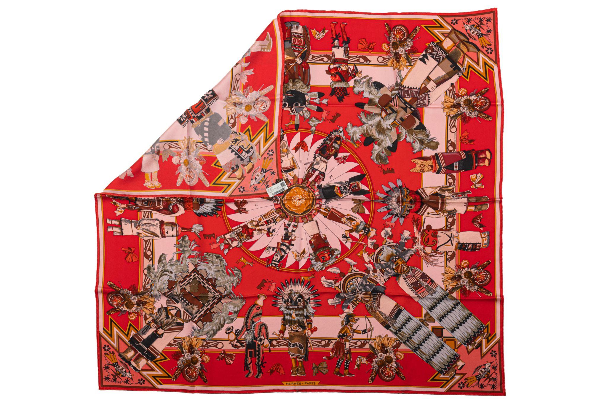 Hermès mint condition collectible Kachinas red coral silk scarf . Designed by Kermit Oliver. Hand rolled edges.
