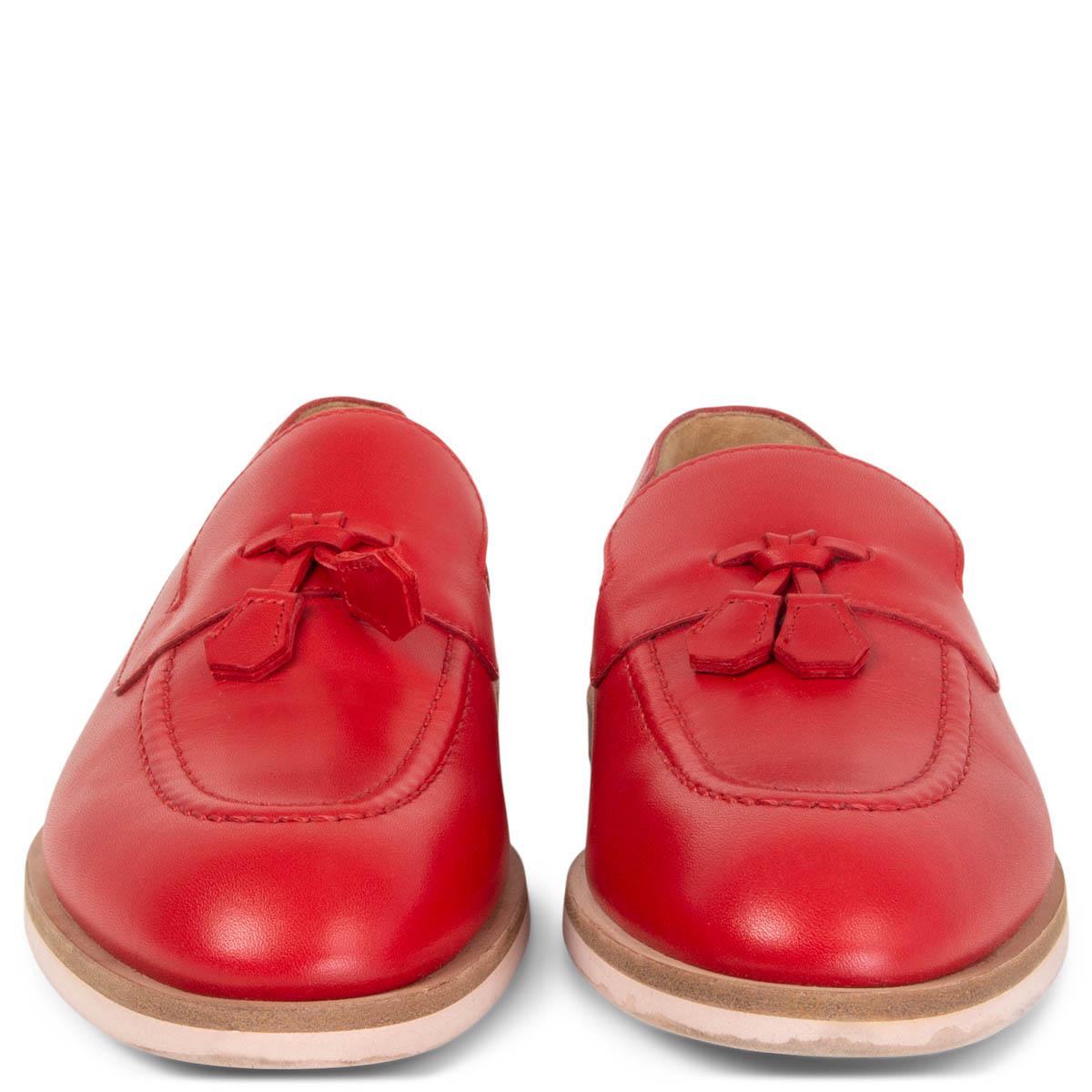100% authentic Hermès tassel loafers in red calfskin and a beige stacked heel and sole. Have been worn and are in excellent condition. Come with dust bag. 

Measurements
Imprinted Size	36
Shoe Size	36
Inside Sole	23.5cm (9.2in)
Width	7.5cm