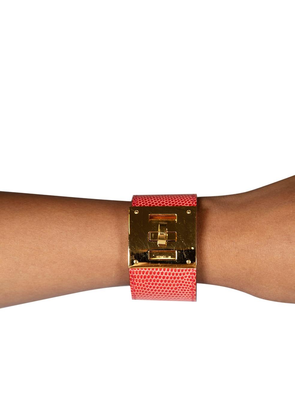 CONDITION is Very good. Minimal wear to the bracelet is evident. Minimal wear to the gold hardware detailing is seen with small abrasion marks and a little creasing to the internal leather on this used Hermès designer resale item.
  
  
  
 