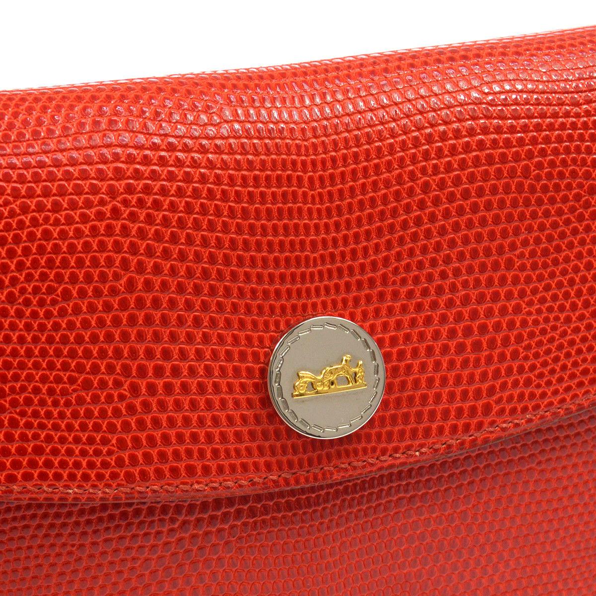 Hermes Red Lizard Exotic Leather Silver Evening Envelope Clutch Flap Bag

Lizard
Silver tone hardware
Leather lining
Snap closure
Date code present
Made in France
Measures 9.5