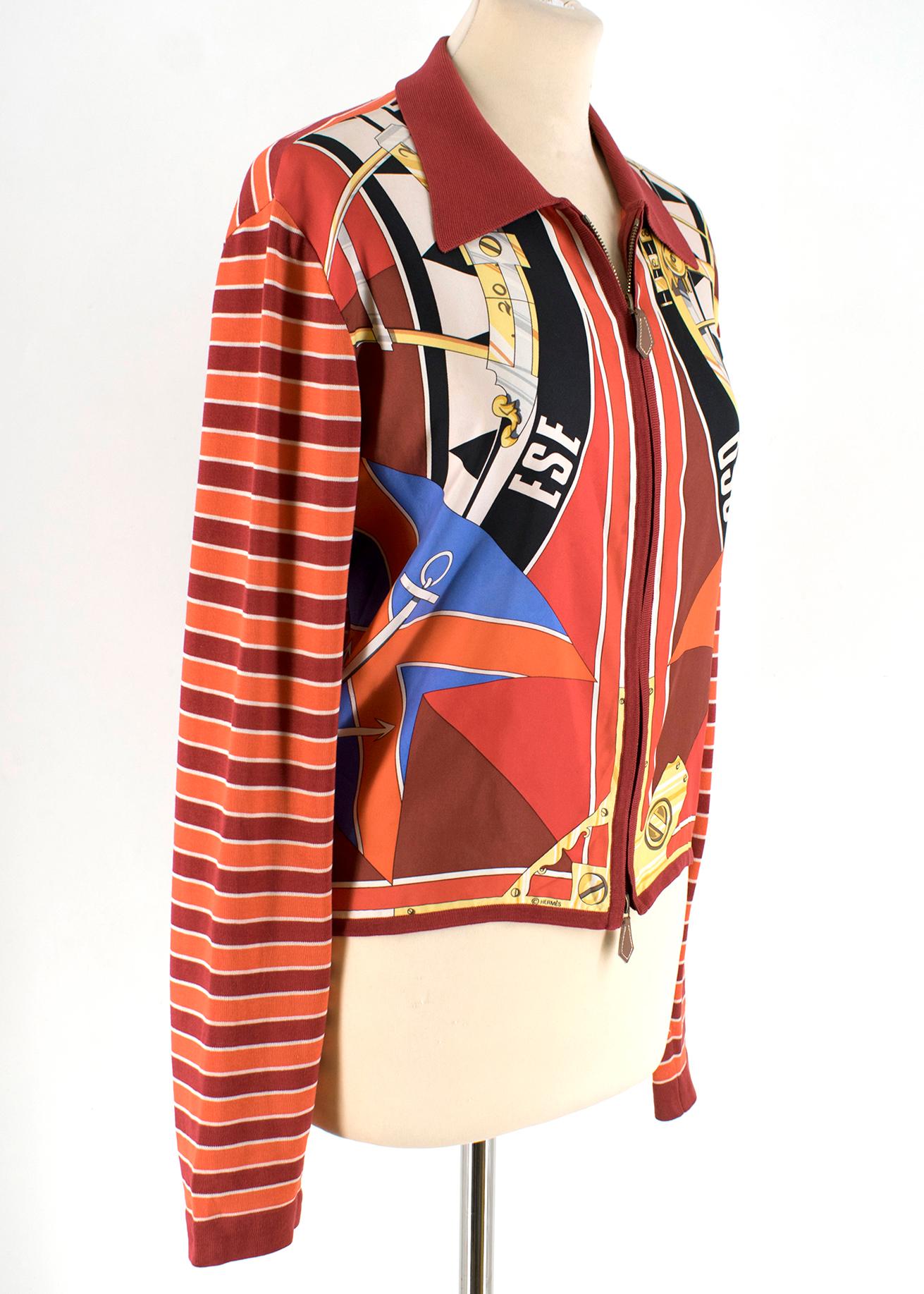 Hermes Red Pattern Zip Up Jacket

Double zip up jacket, with print design,
Long sleeves,
Stripe design along sleeves and rear, 
Front centre gold-tone full zip hardware, 
Point collar, 
Silk pattern on the front of jacket,
Lightweight 

Please note,