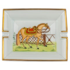 Posacenere Hermès con cavallo da sella rosso