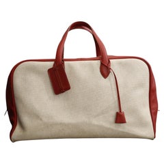 Hermes Red Taurillon Clemence Leather and canvas “Victoria” travel Large Bag 50