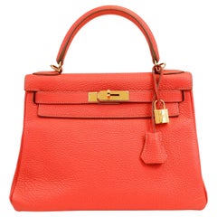 Hermès Rotes Togoleder 28 cm Kelly mit Goldbeschlägen