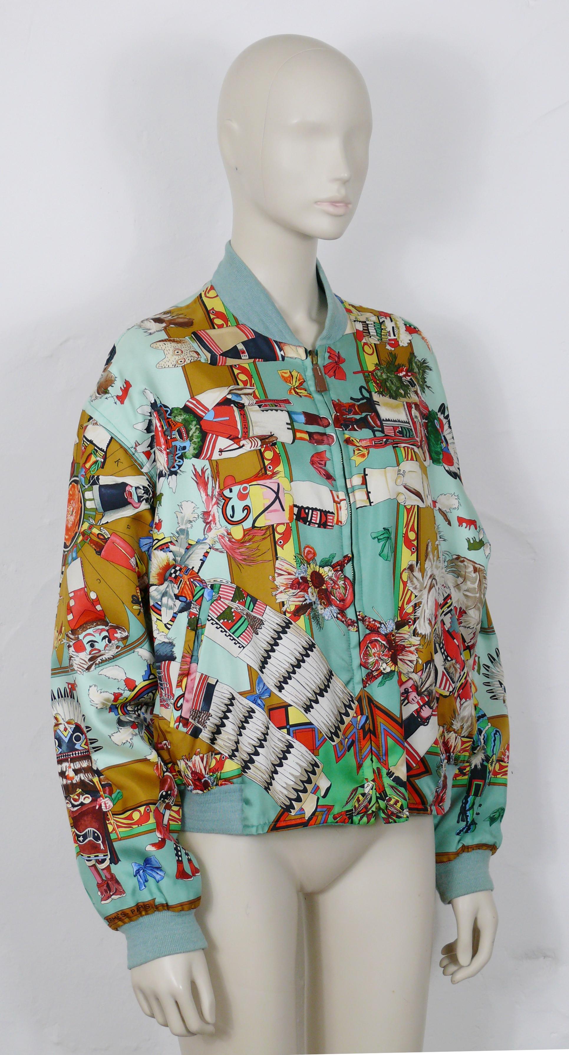 HERMES vintage rare reversible bomber jacket KACHINAS designed by native Texan KERMIT OLIVER.

The jacket print depicts ceremonial spirit dancers according to western Pueblo religious beliefs.

This jacket features :
- Opulent multicolored design on