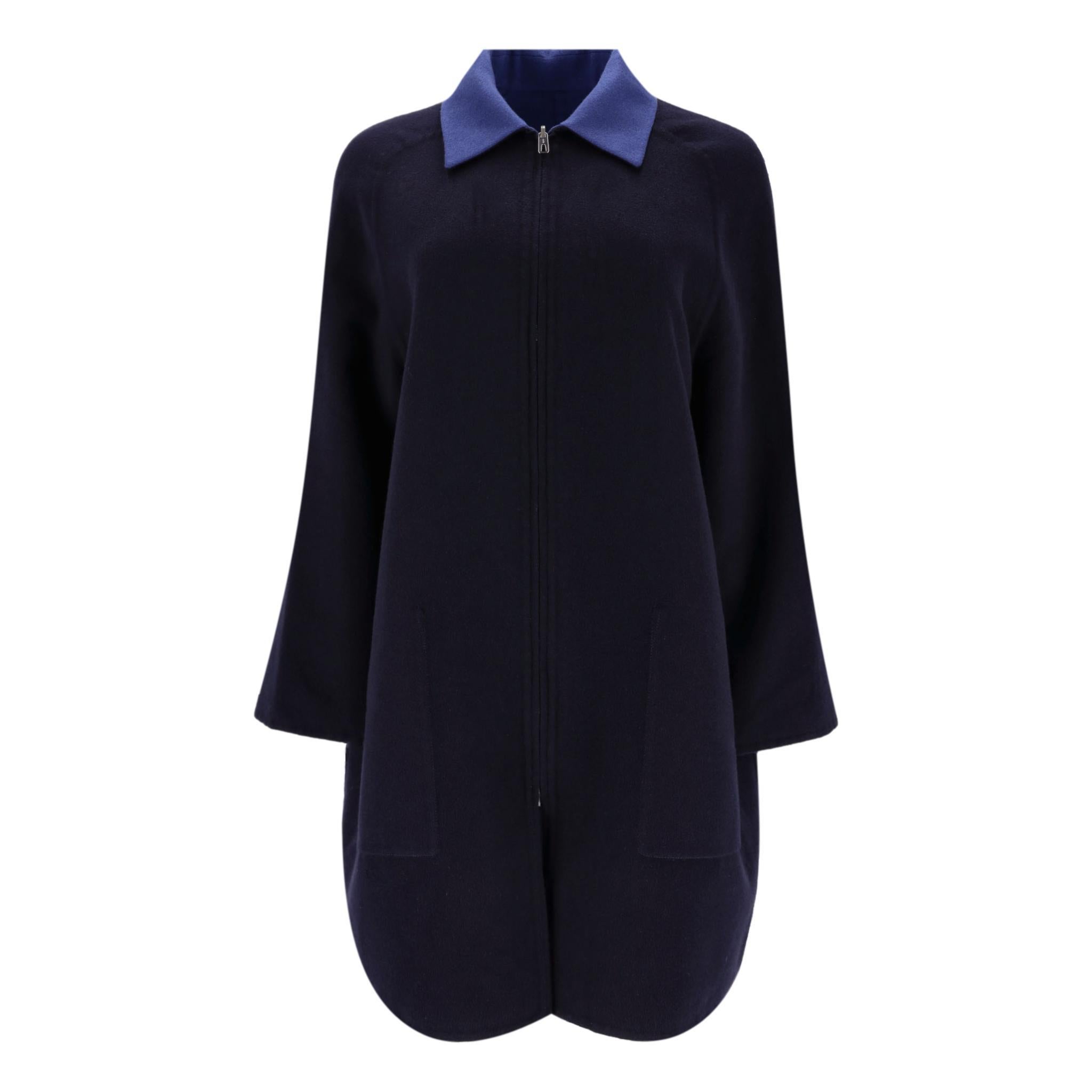 Hermes Reversible Cashmere Coat

Reversible coat fully crafted from soft cashmere with navy body detailed with contrasting blue collar to one side and opposite design to the other side.

Featuring centre zip fastening, discreet pockets and folded