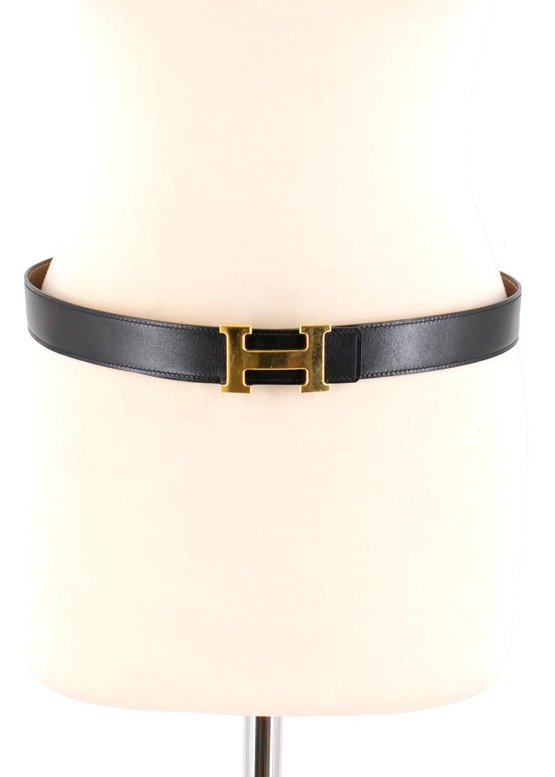 Hermes Black Leather Belt with Gold Buckle

Age - 2011 [o]
Belt buckle in brushed permabrass plated metal
Reversible leather strap in 135 and Togo calfskin 
Constance H Buckle
Contrasting white stitching
Three holes


Approx;
Width- 3.2cm
Length-