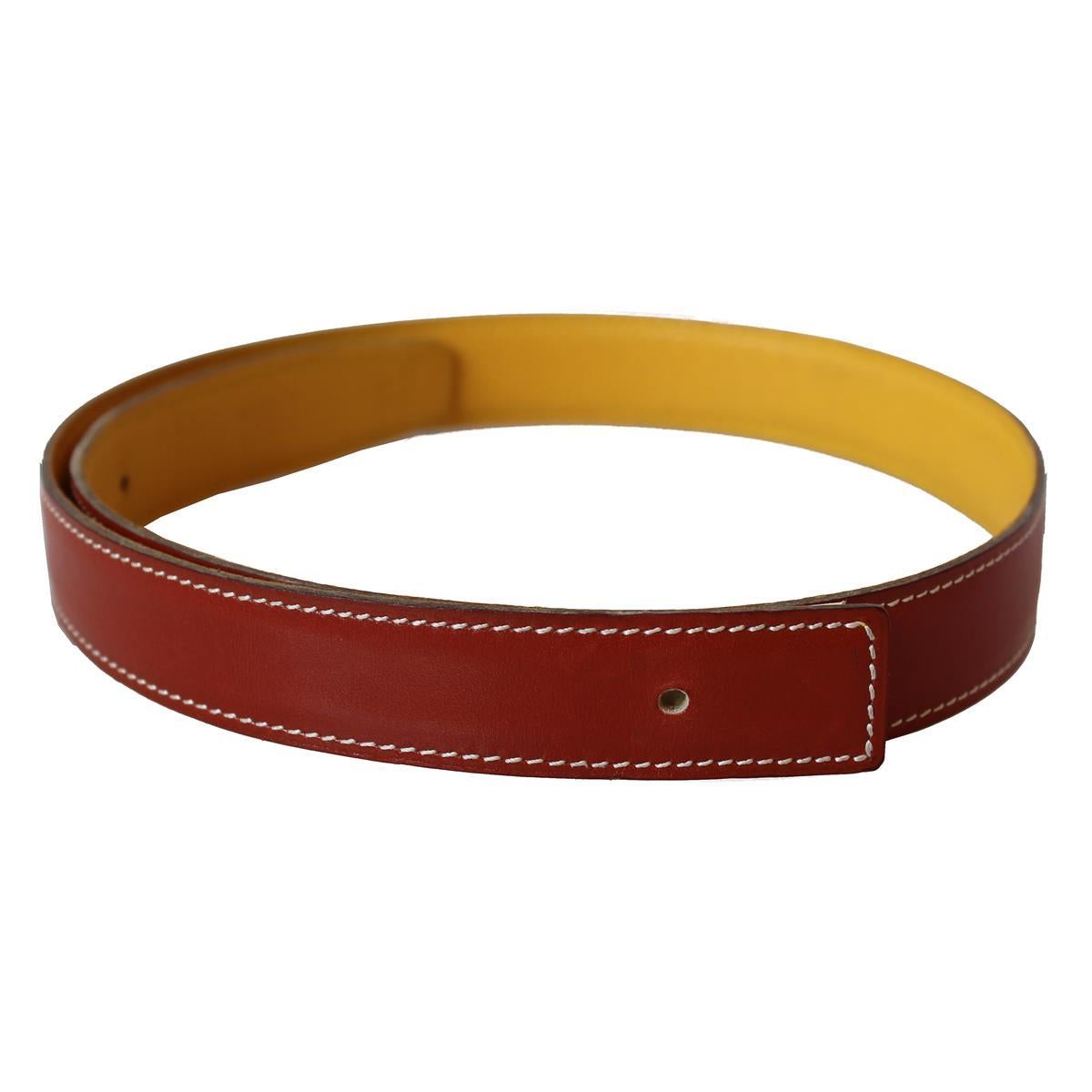 Iconic reversible belt strap (without buckle)
Leather
Ochre color on first side, clay on other
2,5 cm height (0.59 inches)
Size 65
Total length cm 80 
Worldwide express shipping included in the price !