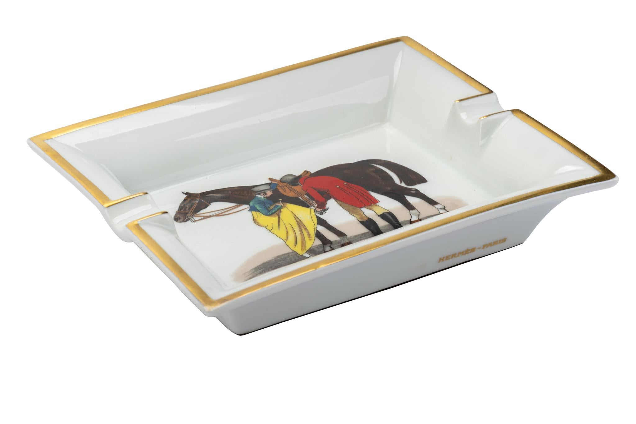 Hermes signature ashtray with bird design in brown, yellow and gold. Suede stamped bottom. Made in France.