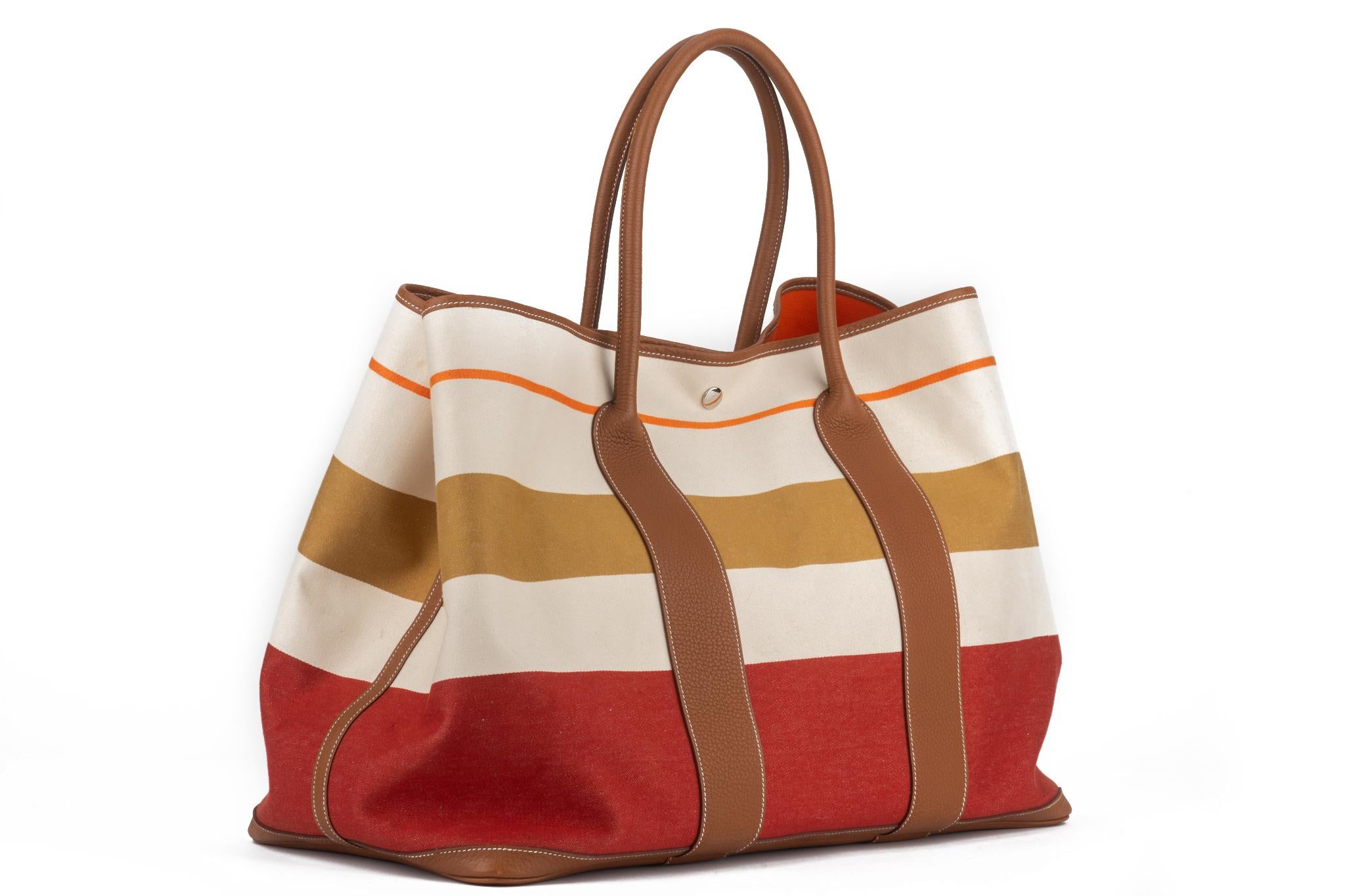 This Hermès Garden Party tote is perfect for everyday use, featuring a simple and clean design. It is constructed from a heavy weight canvas and leather handles for great durability. Oversize bag.
