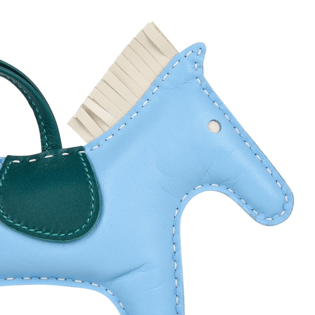 Guaranteed authentic coveted Hermes MM features retired Blue Celeste Rodeo horse charm with Craie tail and mane.
Saddle and holder are Malachite.
Skin is lamb Milo
Signature HERMES PARIS MADE IN FRANCE is stamped under saddle.
NEW or NEVER WORN. 