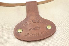 Hermès Rodéo bag in linen and leather.