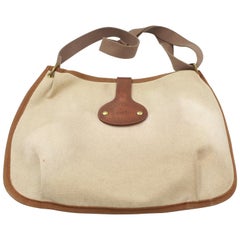 Hermès Rodéo bag in linen and leather. 