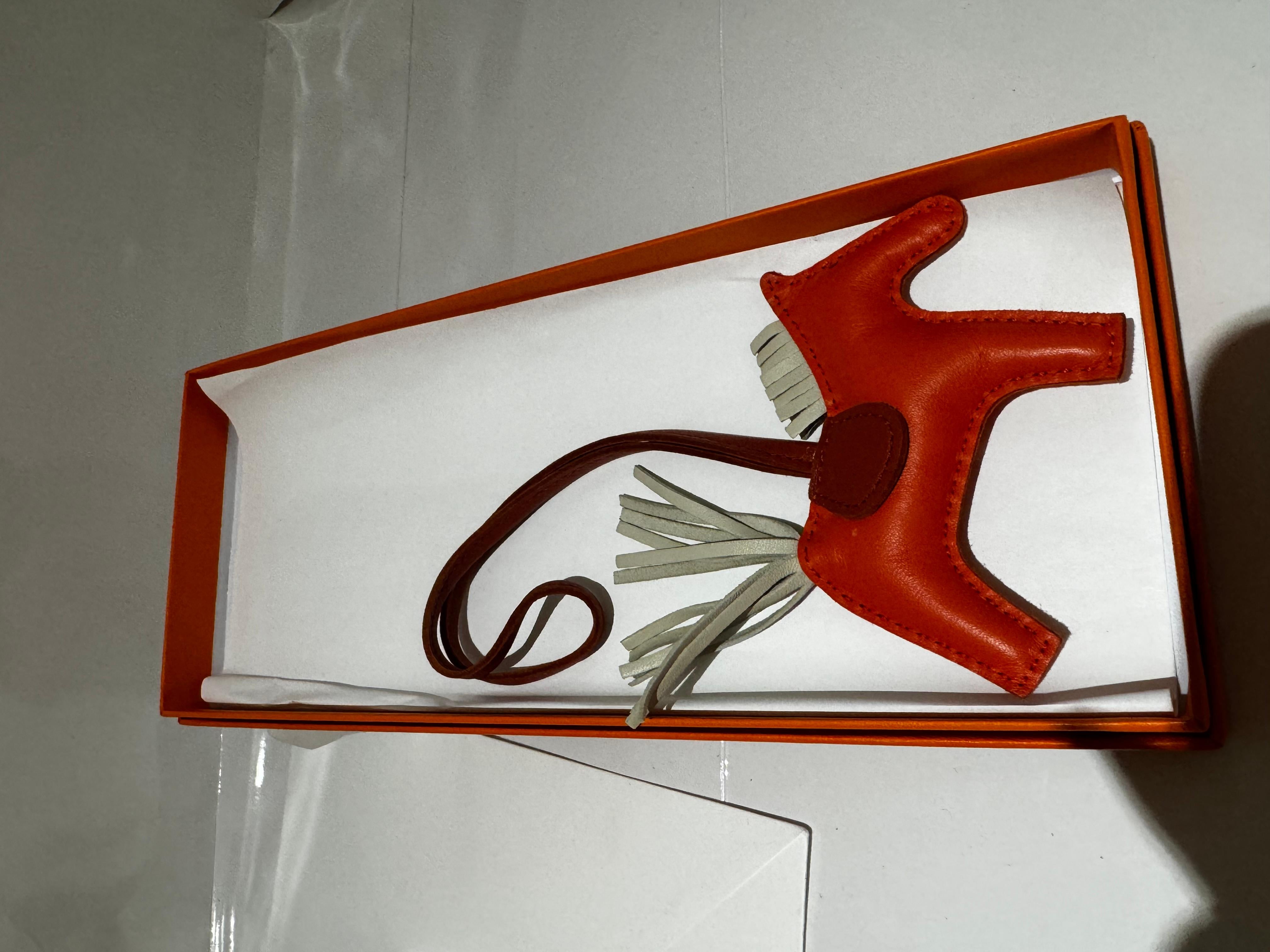 Hermes Rodeo Horse Bag Charm PM in Orange, Craie and Terre Bateau. Comes with box 