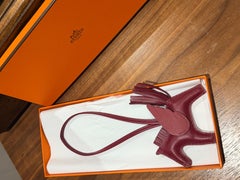 Hermes Rodeo Pegase PM charm in Rouge Grenat