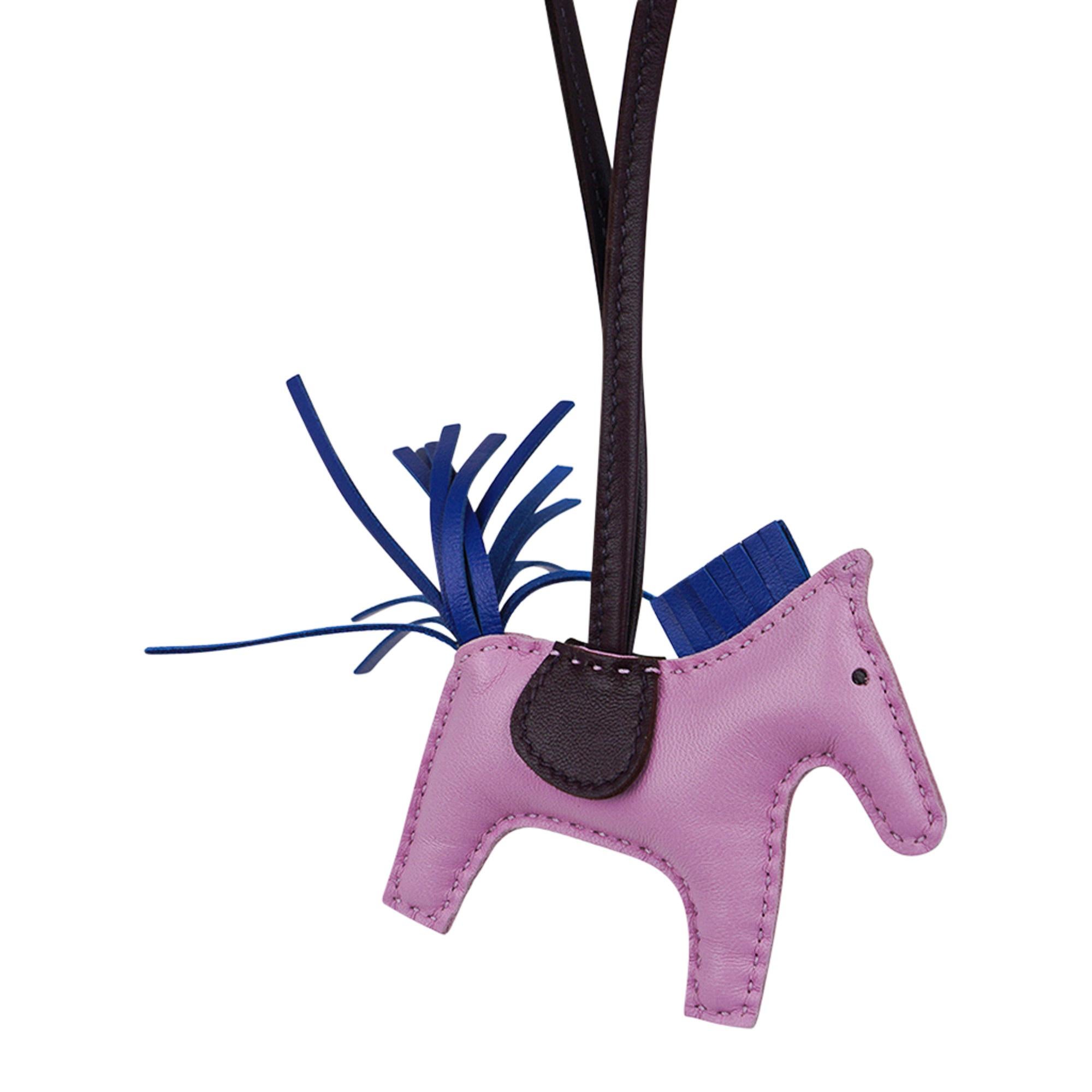 Mightychic offers an Hermes PM Rodeo bag charm featured in Mauve Sylvestre, Blue de France and Rouge Sellier.
Charming and playful she easily adorns a myriad bag colors in your fabulous collection.
Skin is Milo lambskin.
Signature HERMES PARIS MADE