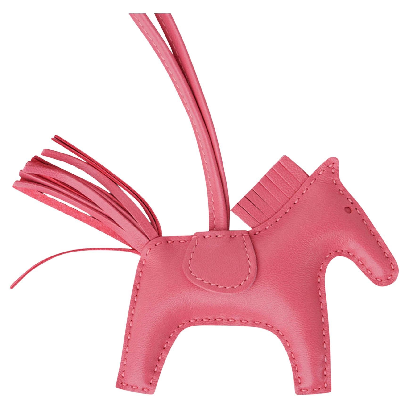 Mightychic offers an Hermes PM Rodeo bag charm featured in Rose Azalee.
Charming and playful she easily adorns a myriad bag colors in your fabulous collection.
Skin is Milo lambskin.
Signature HERMES PARIS MADE IN FRANCE is stamped under