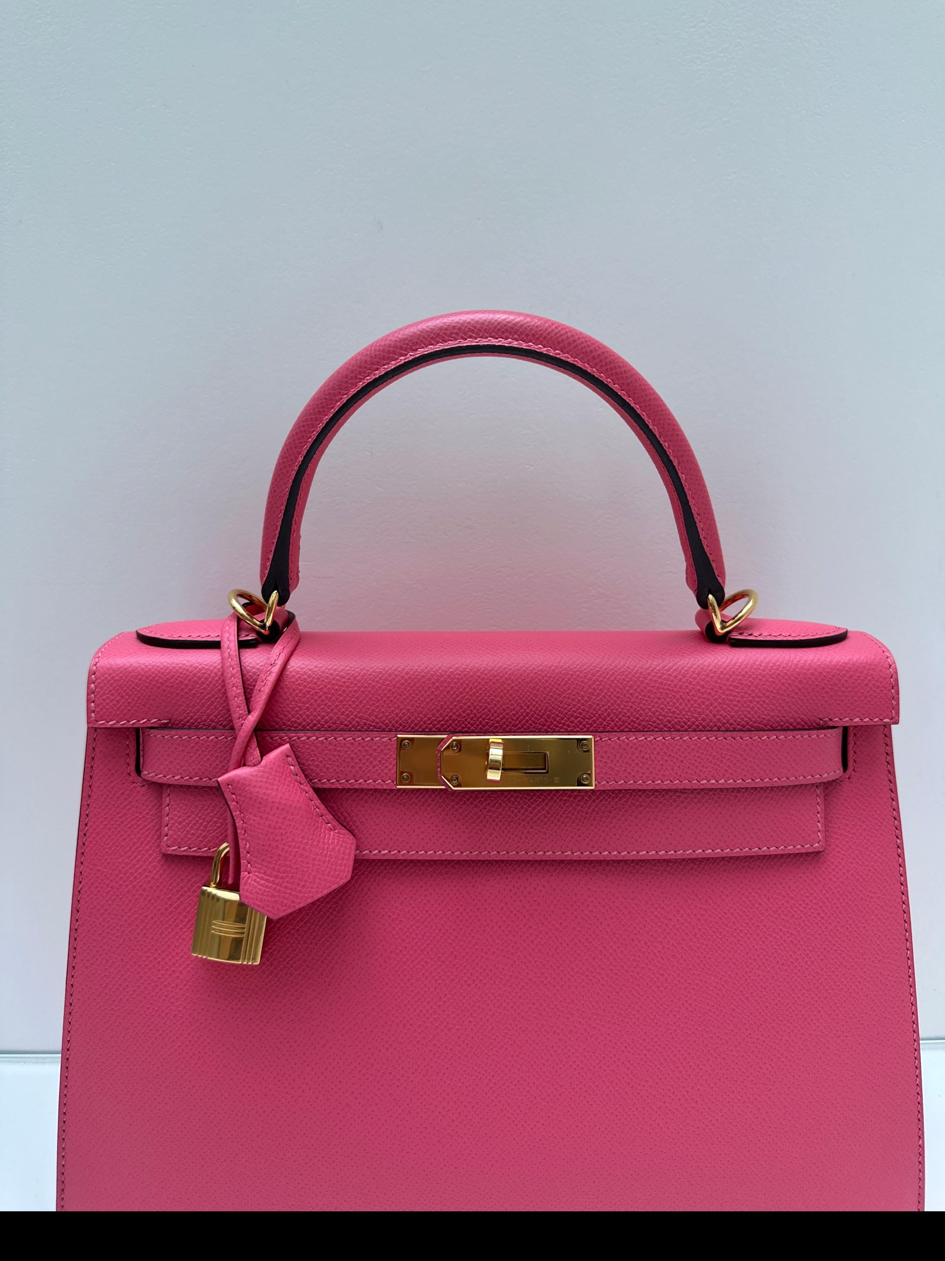 Hermes Rose Azalea Kelly 28 Bag. Sellier epsom leather. Gold hardware. Excellent condition except small mark on the handles. You can put a twilly on it. C stamp. Looks amazing. Interior clean. Includes strap, clochette, lock, keys, and dust bag.