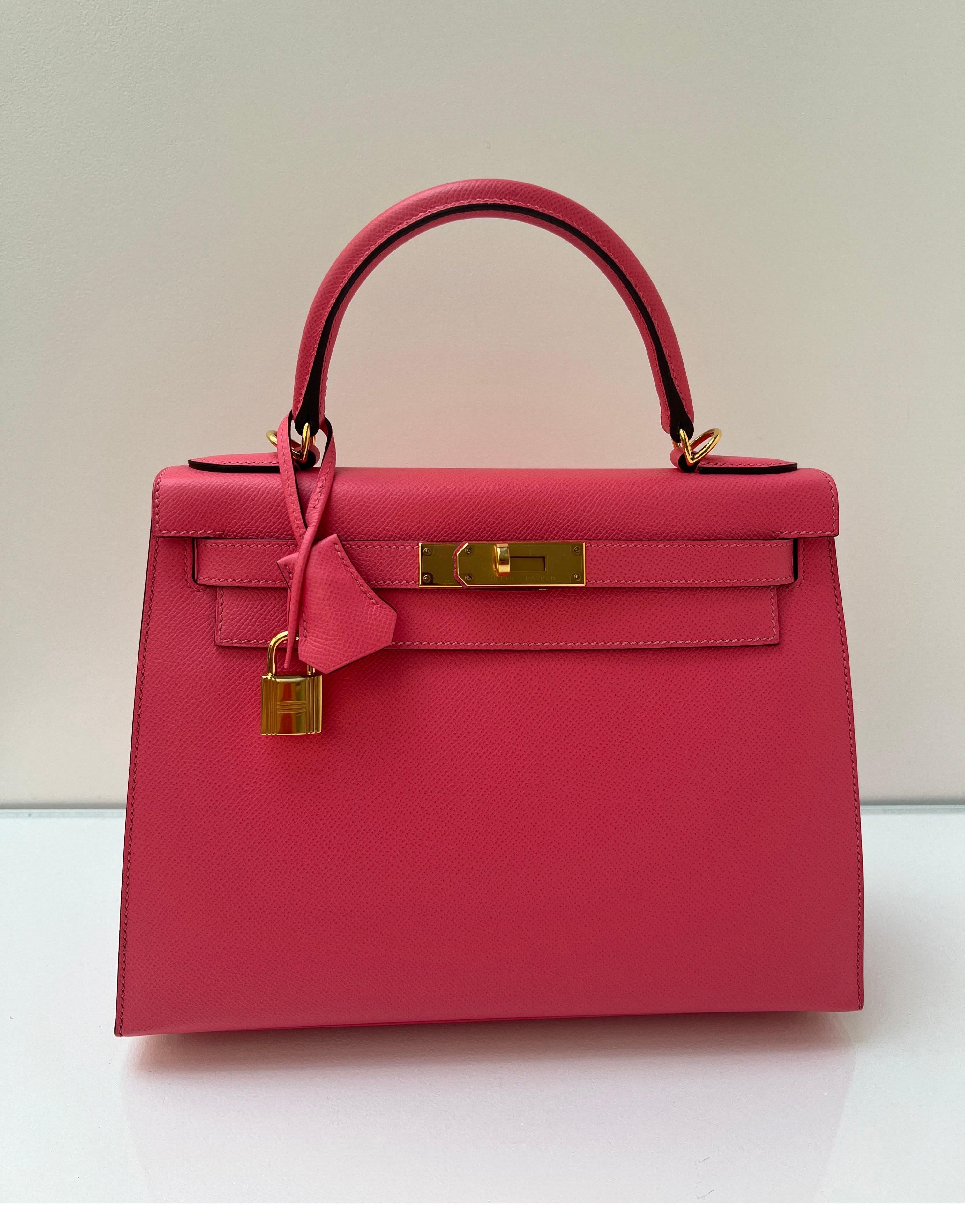 Hermes Rose Azalea Kelly 28 Bag. Sellier epsom leather with gold hardware. Interior clean. Good condition. Only one light spot on handle. Please see photos. Otherwise, looks like new condition. Will include an Hermes twilly to cover the spot.