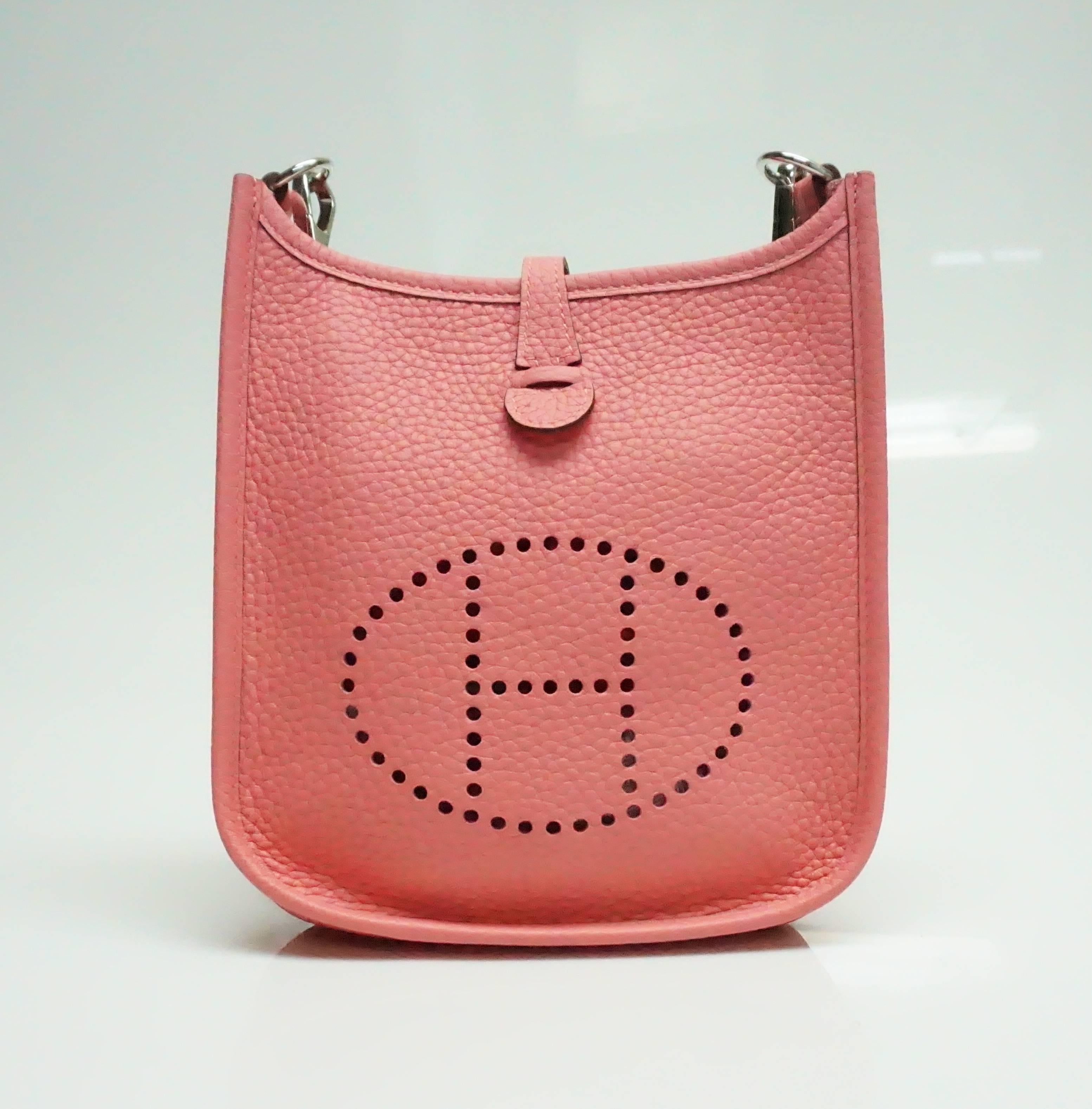 This beautiful Hermes TPM Mini Evelyne crossbody is made of Clemence leather in the color Rose Azalee. This bag is new and was never carried and comes with the box and duster.

Measurements
Length: 7