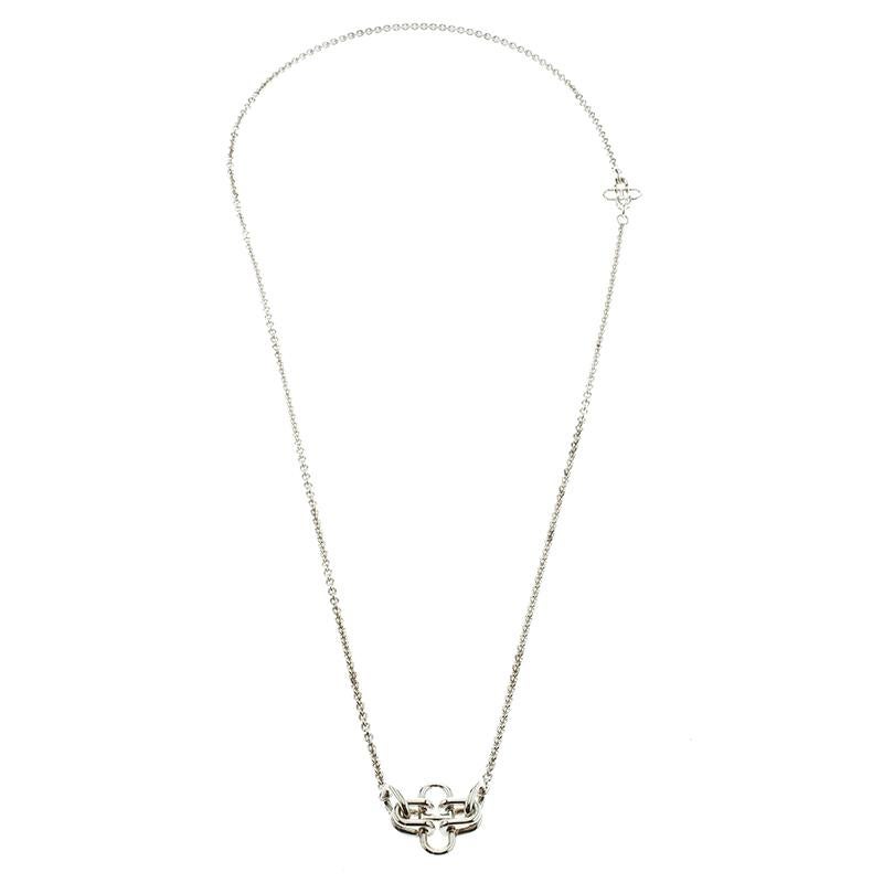 This long necklace from Hermes is sure to catch an eye and make your heart skip a beat. The necklace is crafted from silver and the chain holds a simple pendant. Flaunt it with your dresses and off-shoulder tops.

Includes: Original Dustbag,