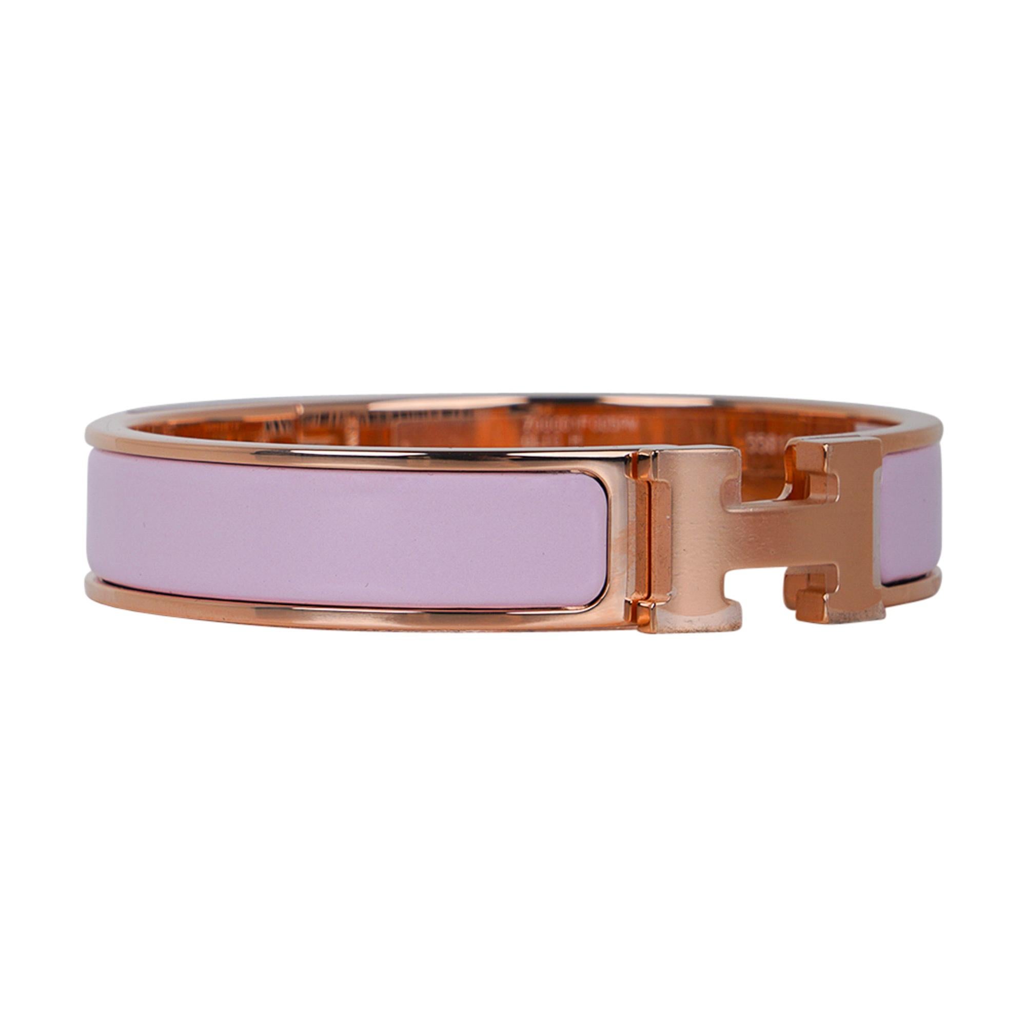 Mightychic offers an Hermes Clic H Bracelet featured in Rose Dragee Enamel.
Rose Gold plated.
Chic, modern and unmistakably Hermes!
A hinged band allows the H to swivel and open the bracelet.
Comes with pouch and signature Hermes box.
NEW or NEVER