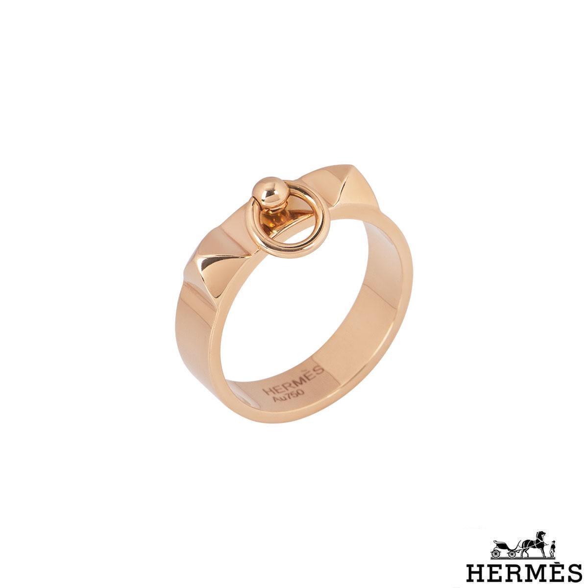An 18k rose gold ring by Hermes from the Collier De Chien collection. The ring features the iconic buckle design with triangle shaped motifs on each side. The ring is a size UK N½/US 6.75/EU 54 with a gross weight of 6.40 grams.

The bracelet comes