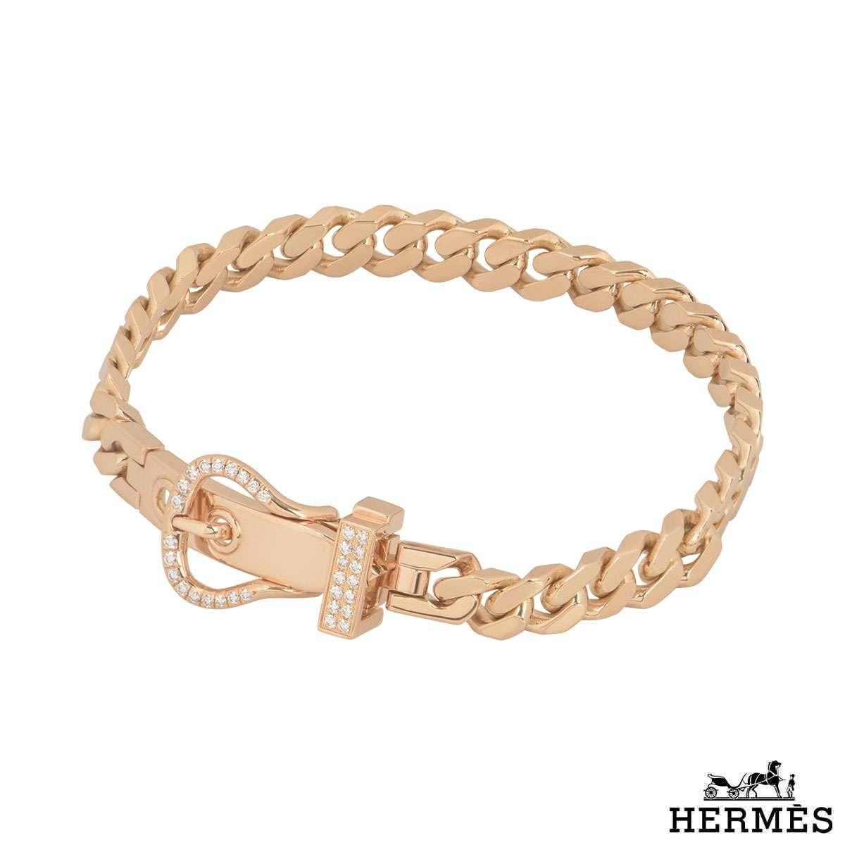 A beautiful 18k rose gold diamond Hermes bracelet from the Boucle Sellier collection. The bracelet comprises of a buckle motif partially set with 32 round brilliant cut diamonds with a total weight of 0.18ct. The bracelet has an adjustable length