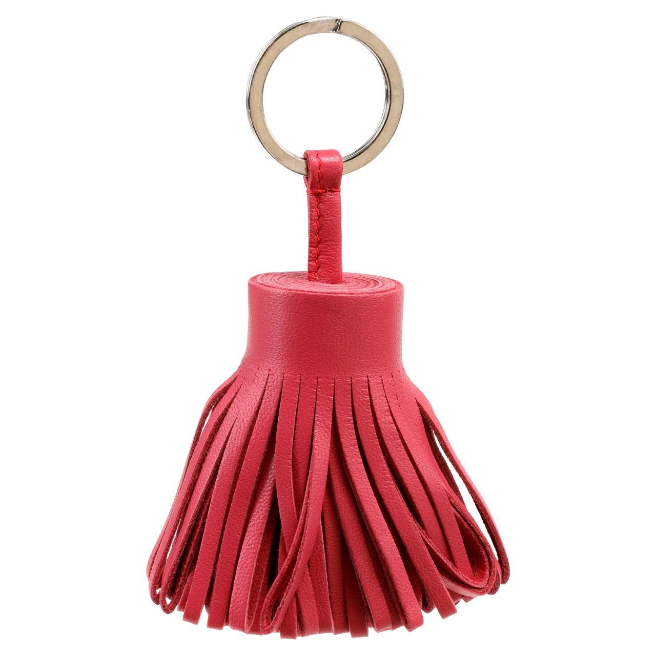 Hermès - Porte-clés en cuir rose à pompons en vente