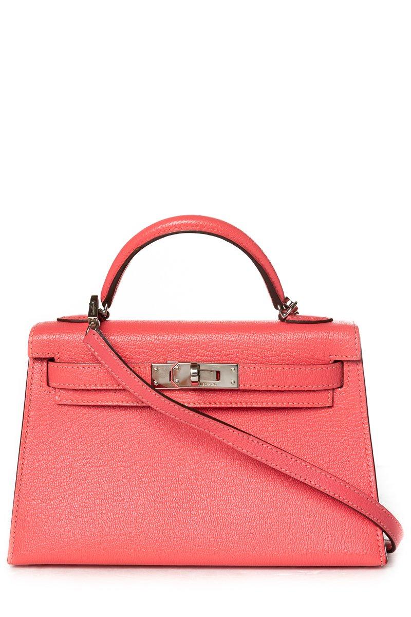Hermès rose lipstick Chevre leather Mini Kelly Sellier II 20 with tonal stitching, palladium-plated hardware, single top handle, detachable flat shoulder strap, protective feet at base, tonal leather interior lining, single pocket at interior wall