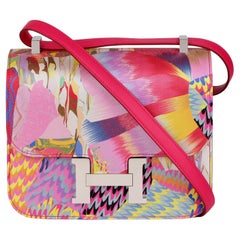 Hermès Rose Mexico Swift in pelle e seta di marmo Constance 24
