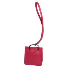 Hermès Rose "Orange Bag Charm"