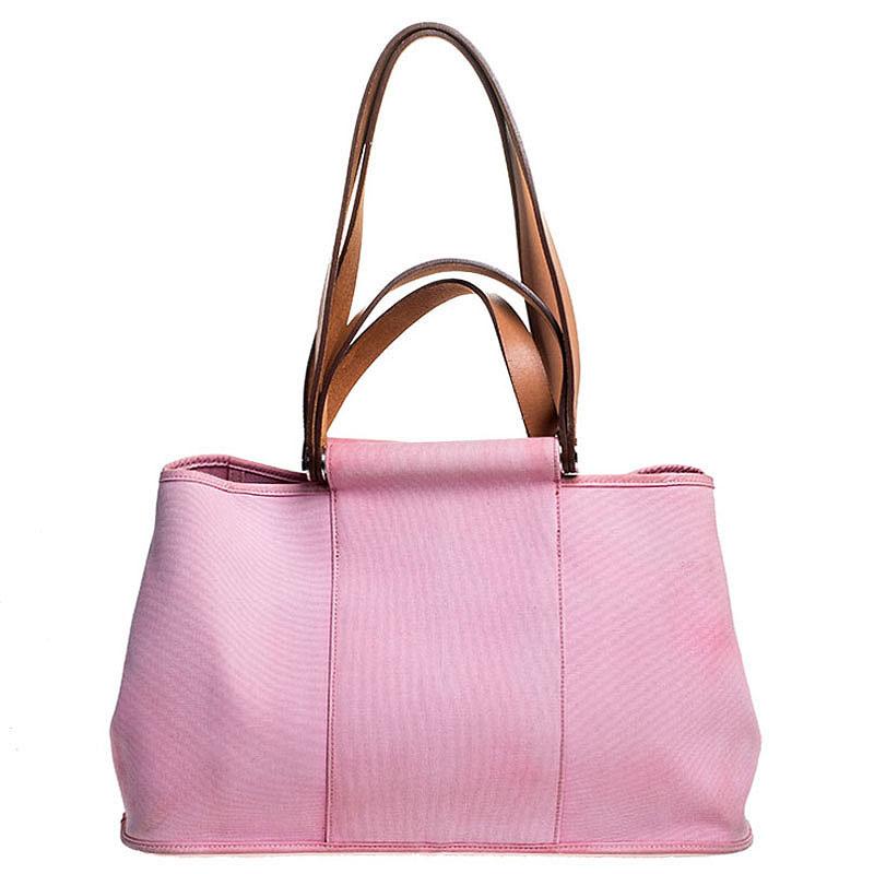 Hermes delivers the highest quality luxury handbags for women and men thus making each design a luxury worth buying. The Cabag Elan is crafted from canvas into a relaxed shape. It has durable leather handles, two of which are shorter than the