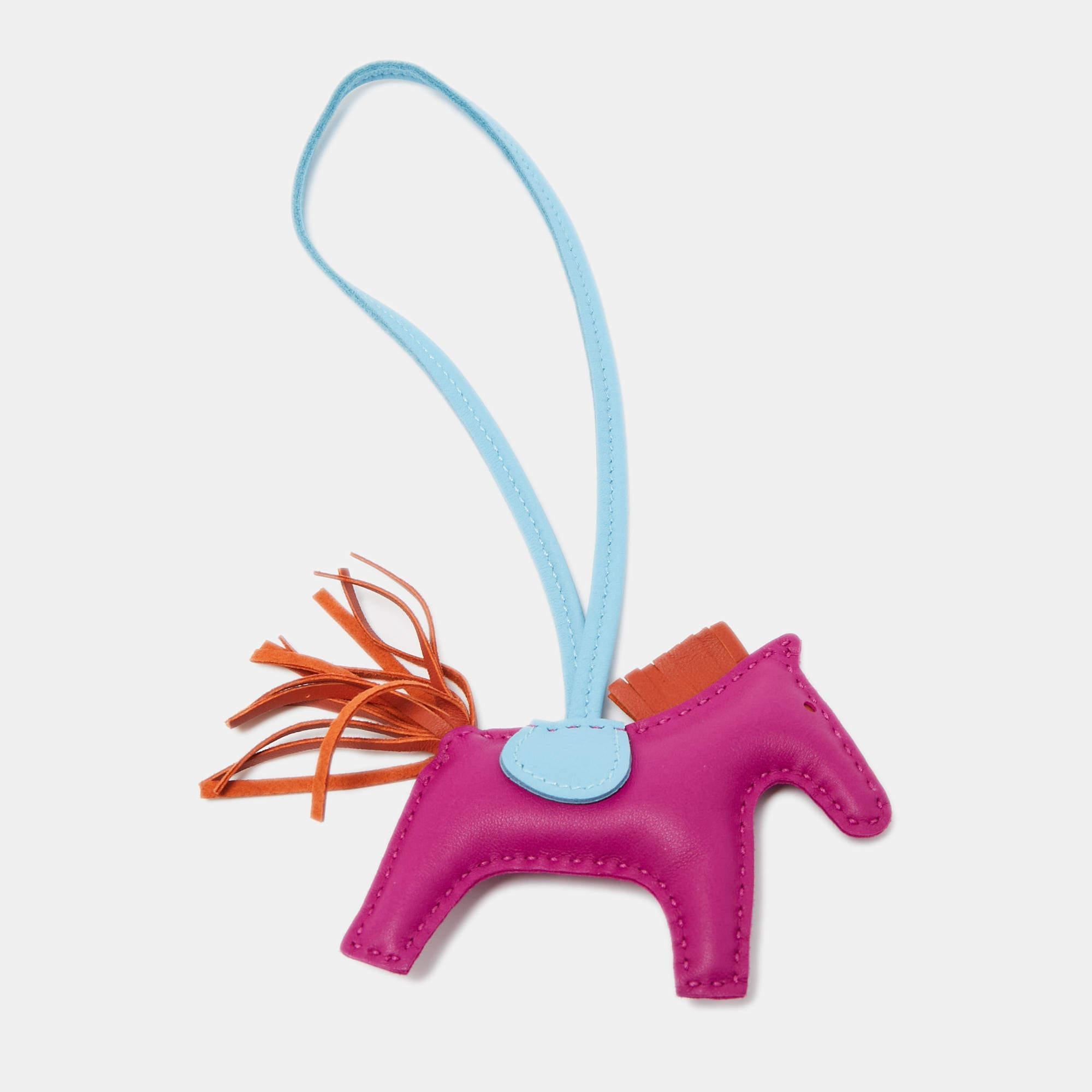 Rodeo bag charms by Hermès come close to being as rare as some of the brand's bags. Collected by fans of Hermès and handbags alike, these little galloping charms are dream pieces to dress up one's precious bags.

Includes: Original Box, Info Booklet