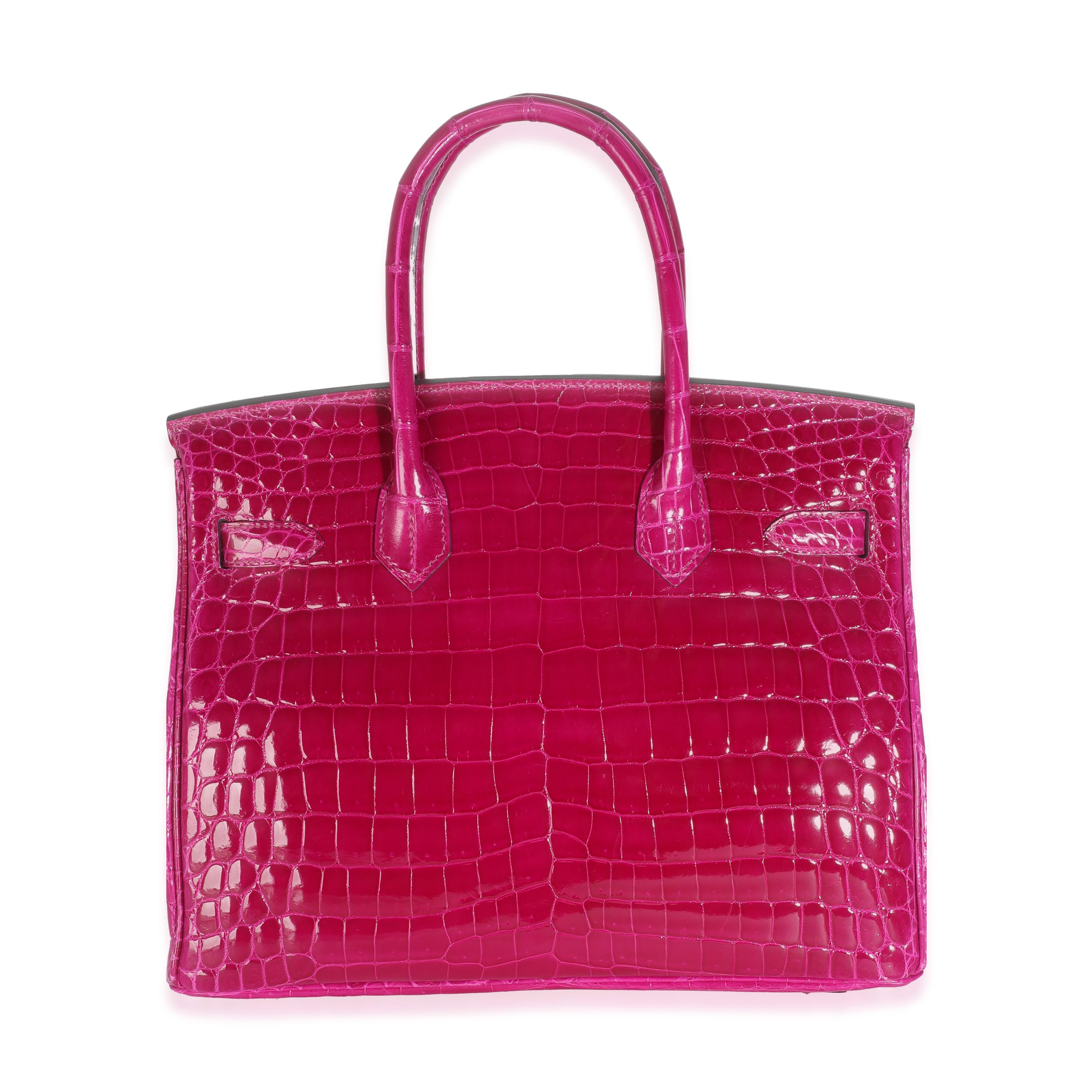 Listing Title : Hermès Rose Pourpre Shiny Niloticus Birkin 30 PHW
SKU : Z145587
Condit : New with tags 
Description de l'état : L'insaisissable sac Birkin d'Hermès a été conçu après que le directeur artistique de l'époque, Jean-Louis Dumas, ait été