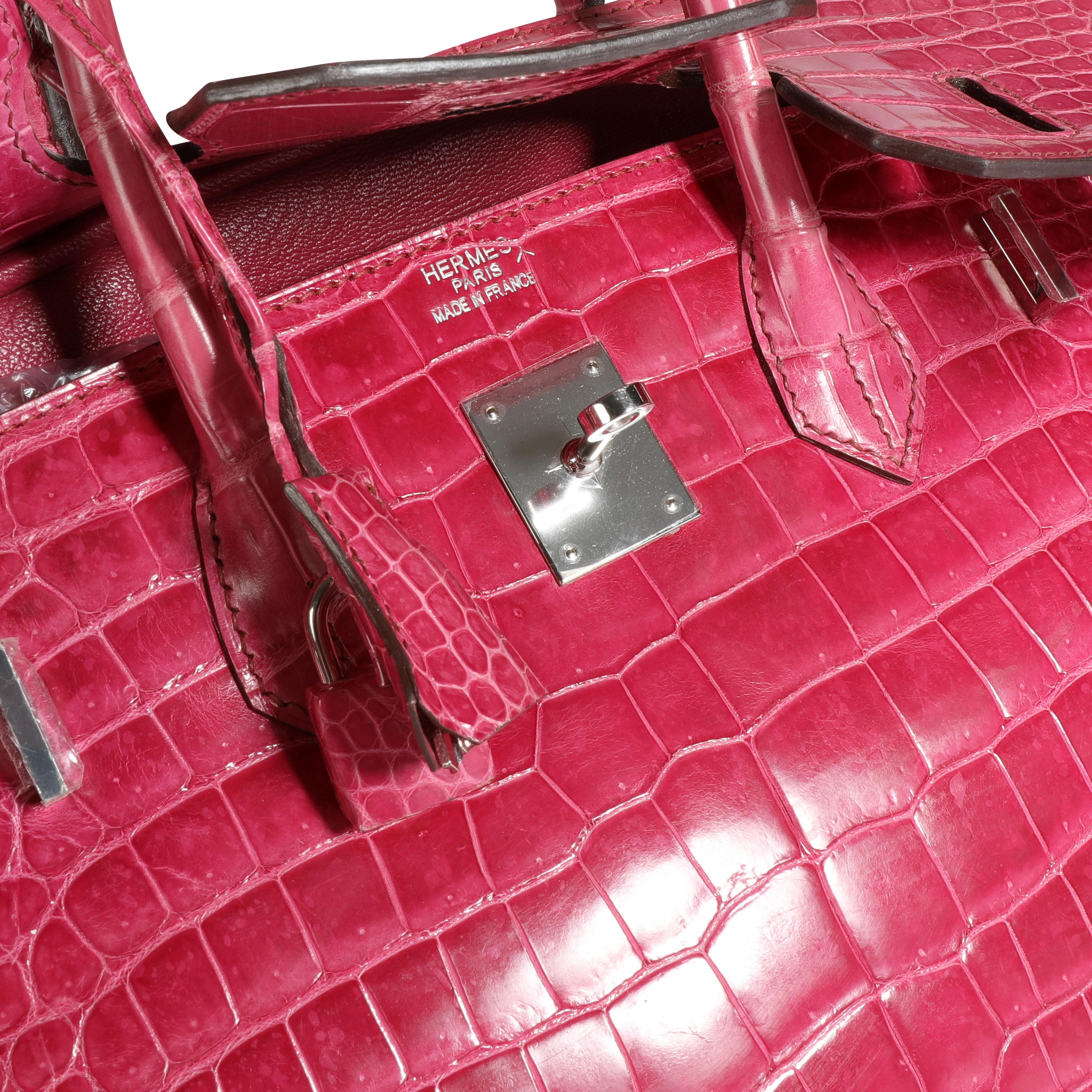 Hermès Rose Scheherazade Shiny Porosus Crocodile Birkin 35 PHW
SKU: 111440

Handbag Condition: Very Good
Condition Comments: Very Good Condition. Plastic on hardware. Darkening to handles. Scuffing to corners. Scratching to feet. Please note: this