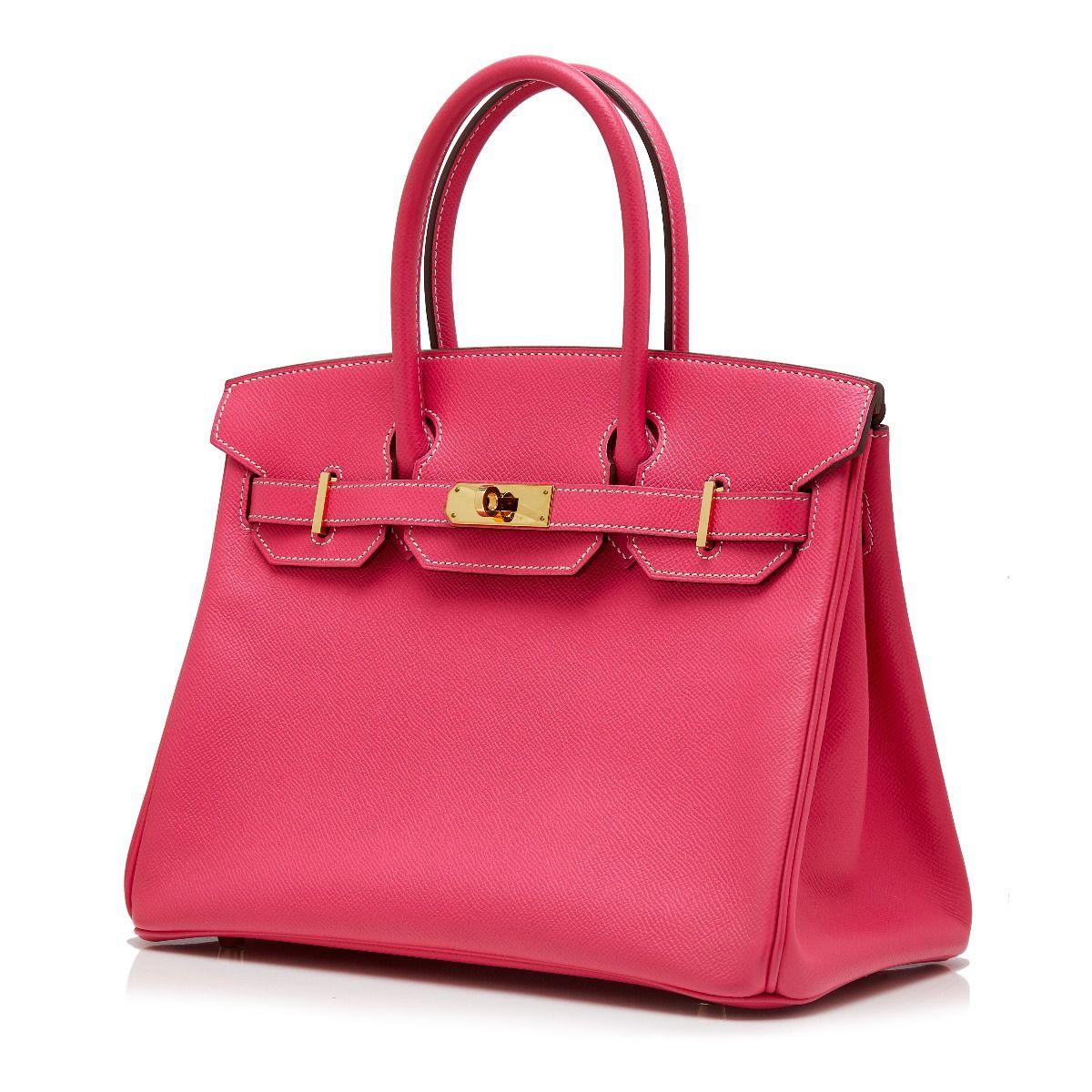Adding a twist to the traditional Hermès Birkin, this truly spectacular, one-of-a-kind rarity combines a vivid rose tyrien espom leather exterior with gold-tone metal accents and contrast stitching for an effect that is unexpectedly modern and