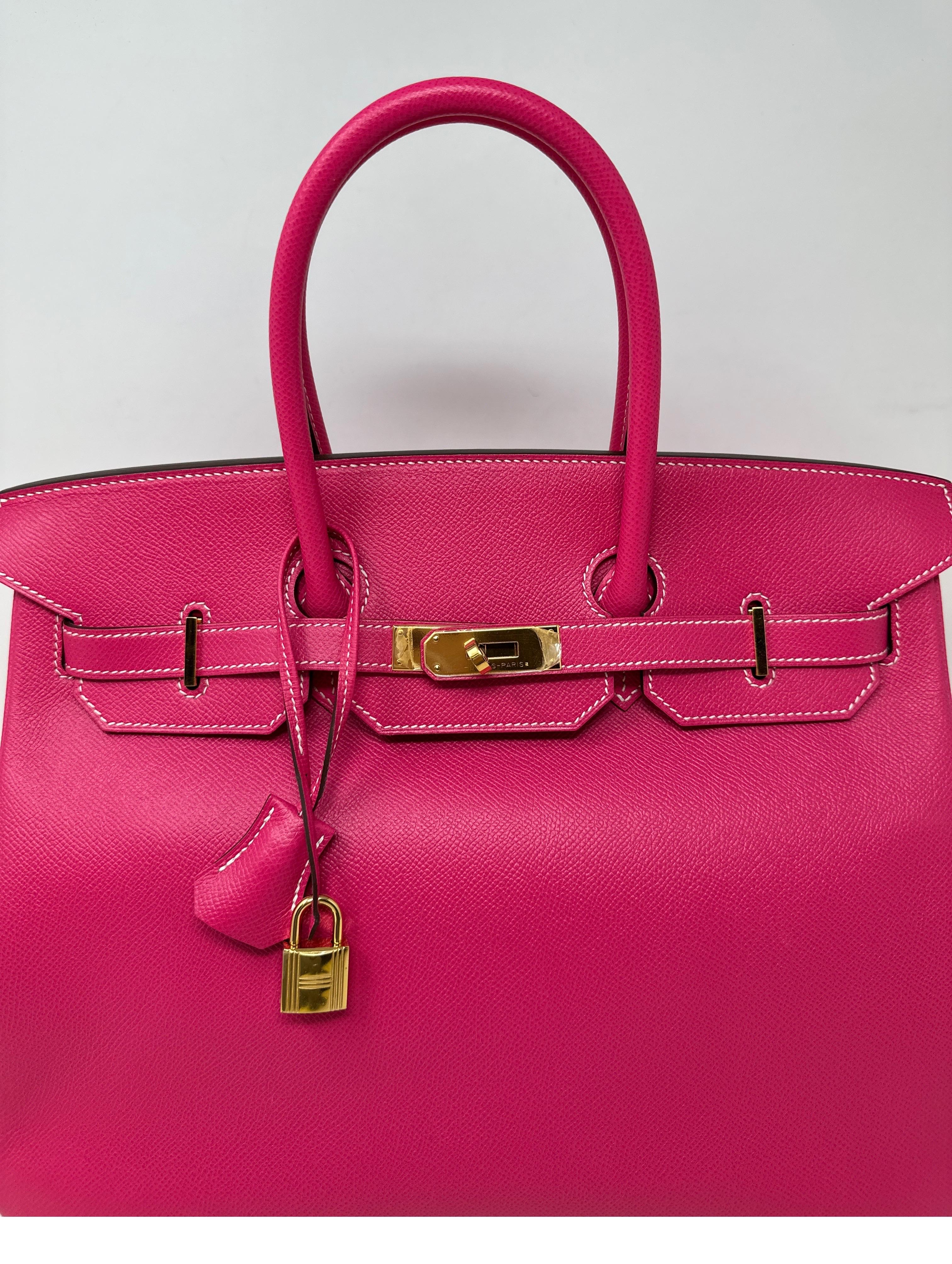 Hermes Rose Tyrien 35 Birkin Bag. Stunning hot pink color Birkin. Gold hardware. Excellent condition. Hard to find combination. Interior clean. Includes clochette, lock, keys, and dust bag. Guaranteed authentic. 