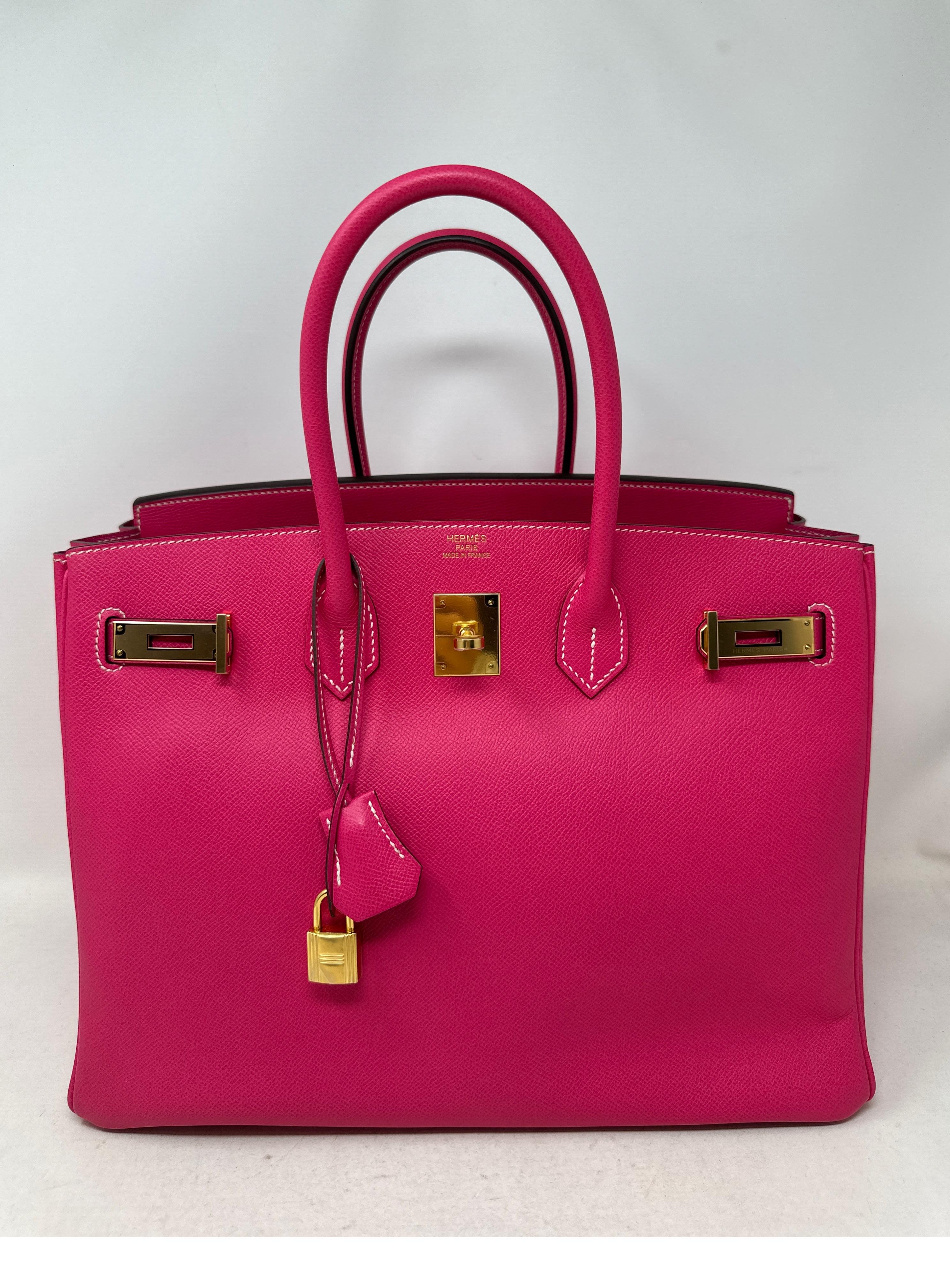 Hermes Rose Tyrien Birkin 35 Bag. Gold hardware. Beautiful hot pink color in epsom leather. Interior clean. Looks like new condition. Rare gold hardware with this pink color. Includes clochette, lock, keys, and dust bag. Guaranteed authentic. 