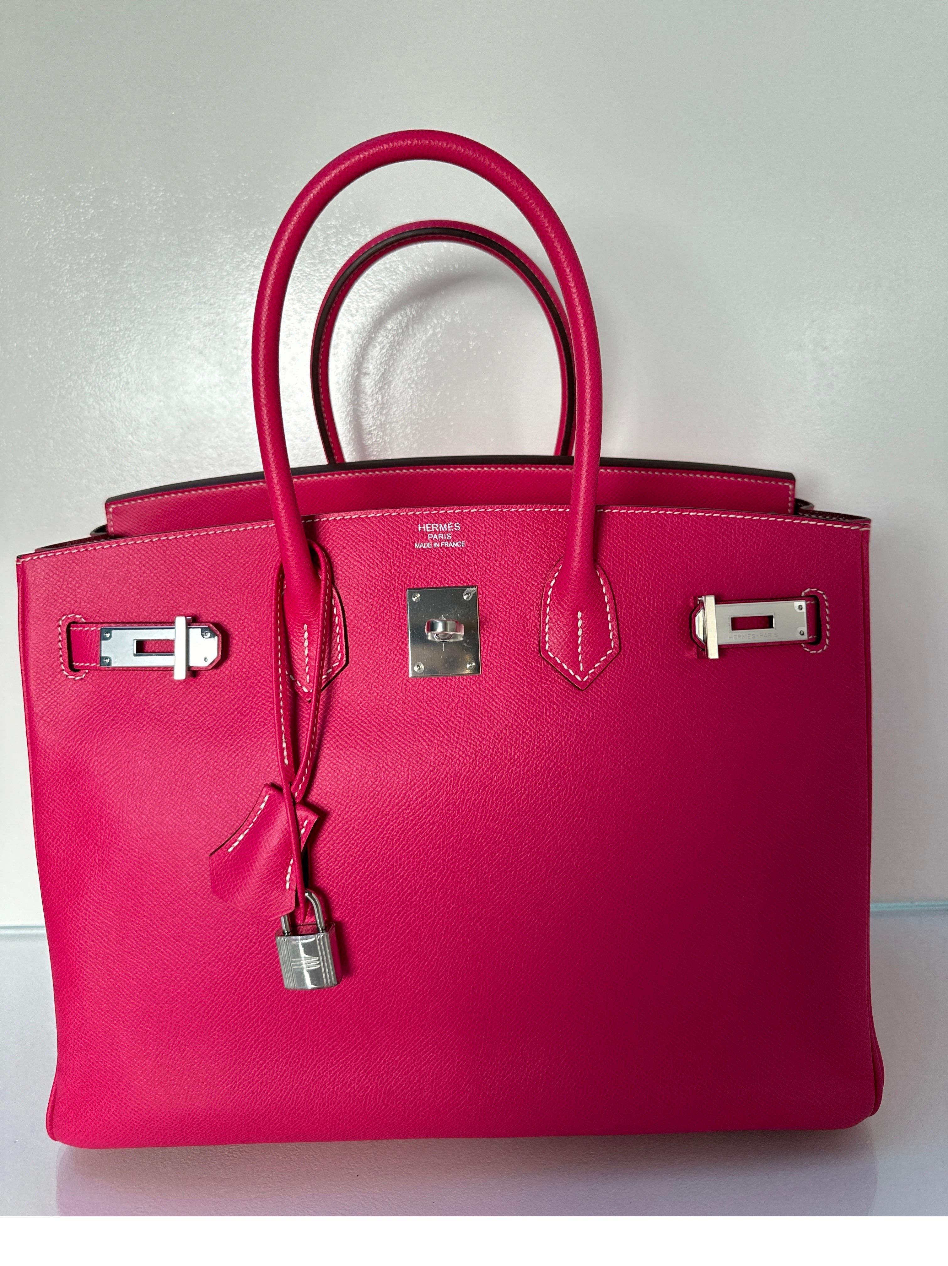 Hermes Rose Tyrien Birkin 35 Bag. Beautiful hot pink color in epsom leather. Palladium silver hardware. Bag is in excellent like new condition. Plastic is still on the hardware. Interior clean. Includes clochette, lock, keys, and dust bag.