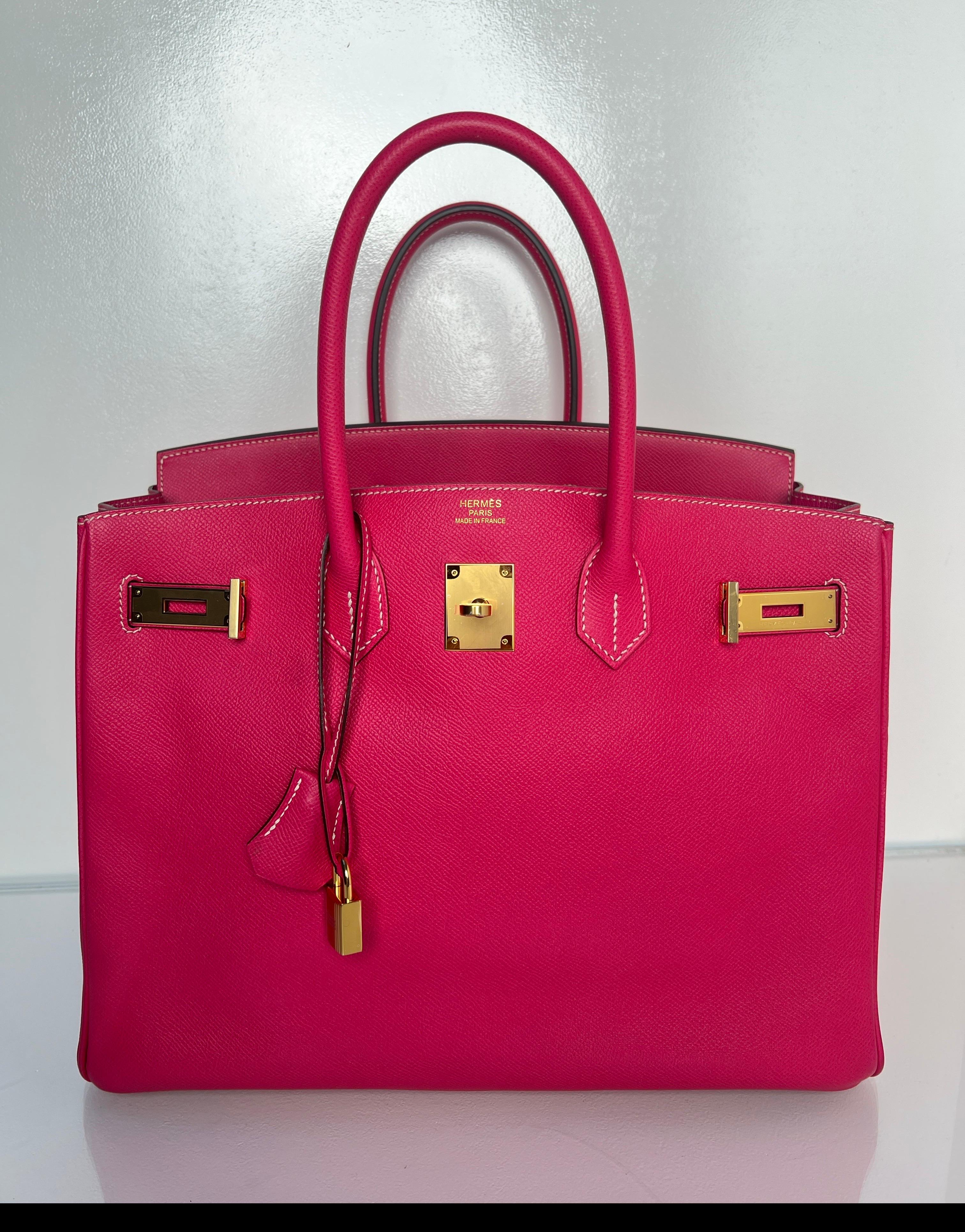 Hermes Rose Tyrien Birkin 35 Bag. Hot pink color with gold hardware. Epsom leather. Contrast white stitching. Gorgeous color bag. Interior clean. Rare combination. Includes clochette, lock, keys, and dust bag. Guaranteed authentic. 