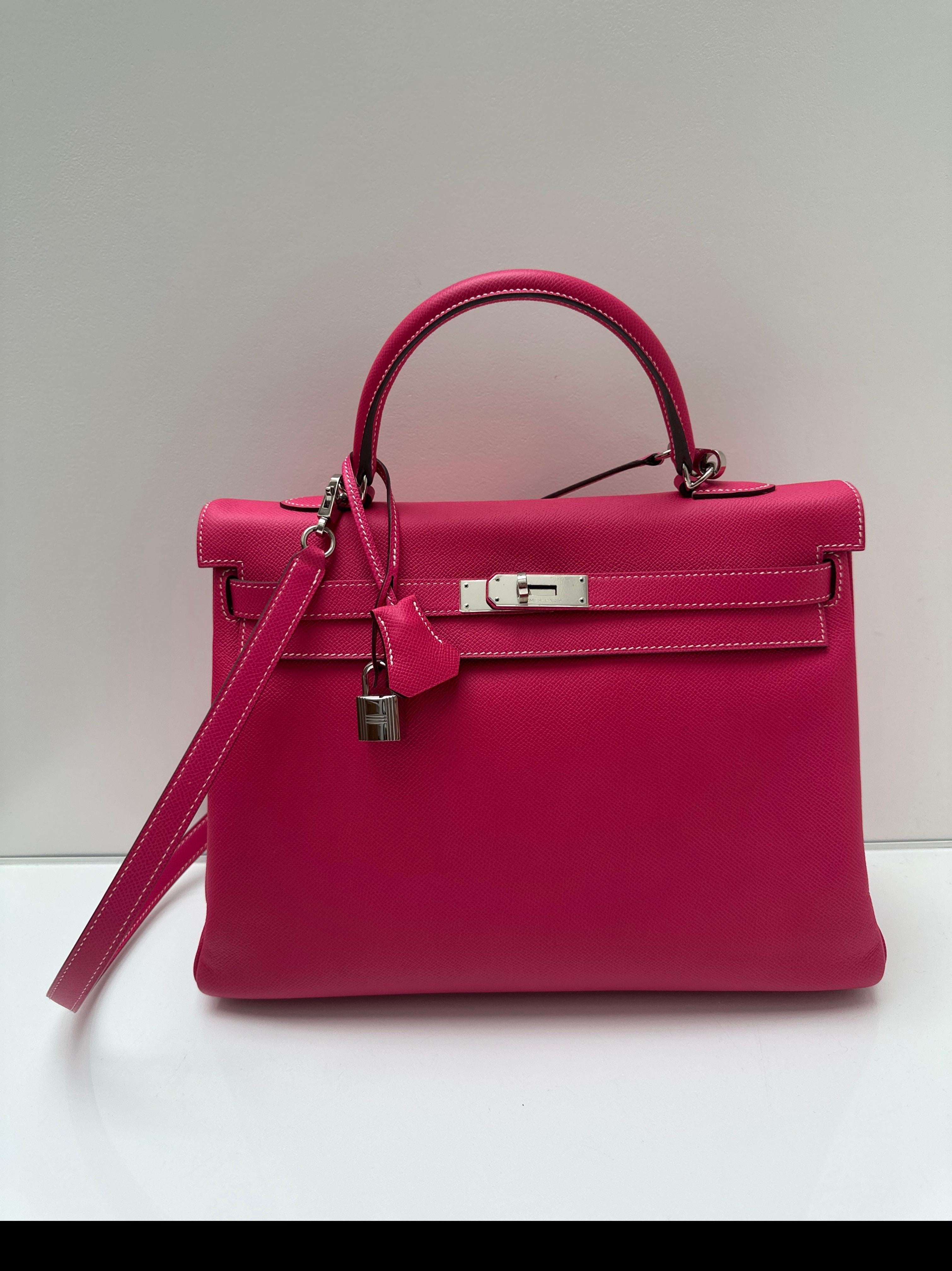 Hermes Rose Tyrien Kelly 32 Bag. Hot pink color with palladium hardware. Excellent condition. Epsom leather. Interior clean. Includes clochette, lock, keys, and dust bag. Has original receipt. Guaranteed authentic. 