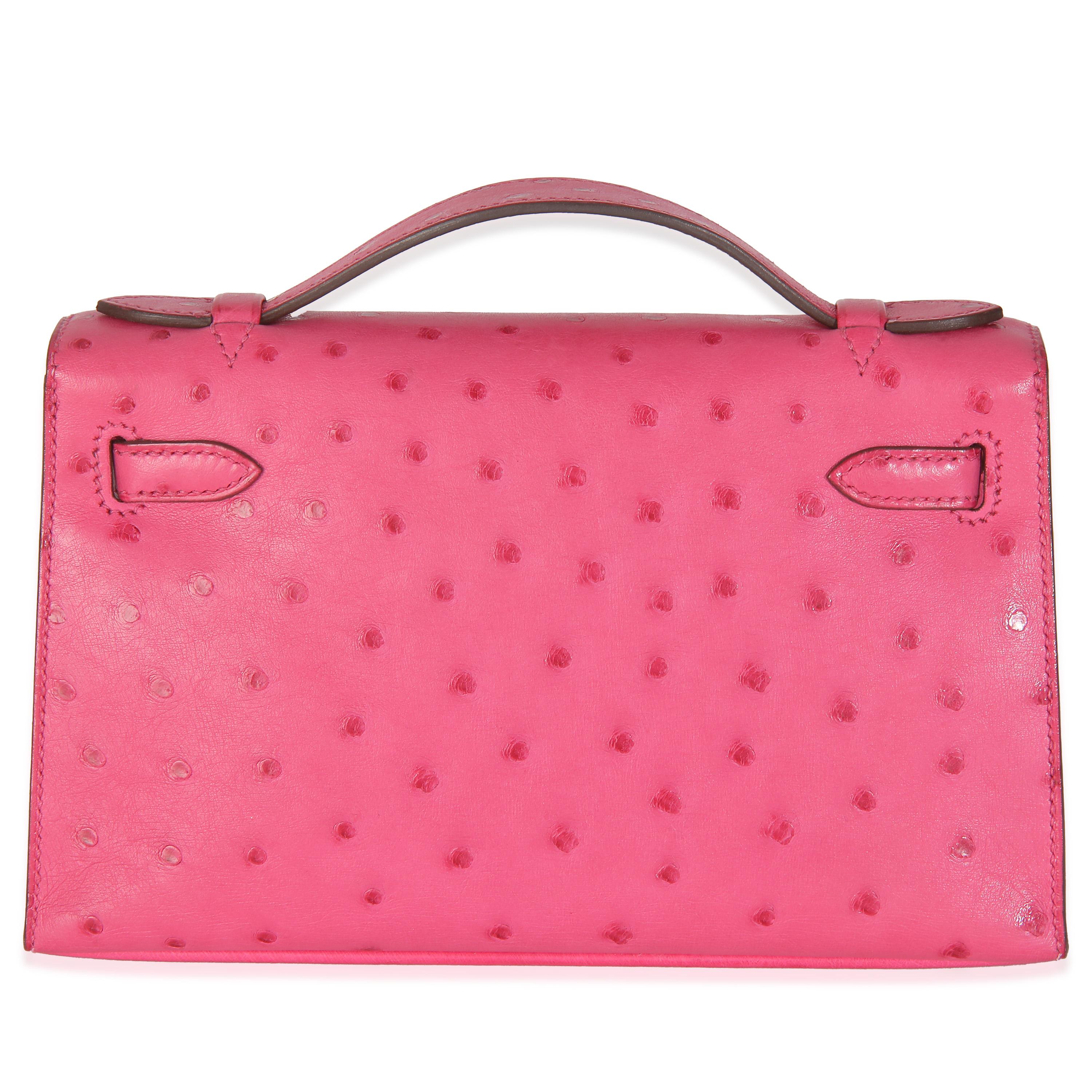 Listing Title: Hermes Rose Tyrien E5 Ostrich Kelly Pochette
SKU: Z146272
Condition: Pre-owned 
Condition Description: Officially renamed in 1977, the Kelly tote bag from Hermès was originally called the Sac à Dépêches (which translates as ‘the