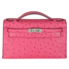 Hermès Rose Tyrien Ostrich Kelly Pochette PHW