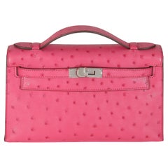 Hermès Rose Tyrien Ostrich Kelly Pochette PHW